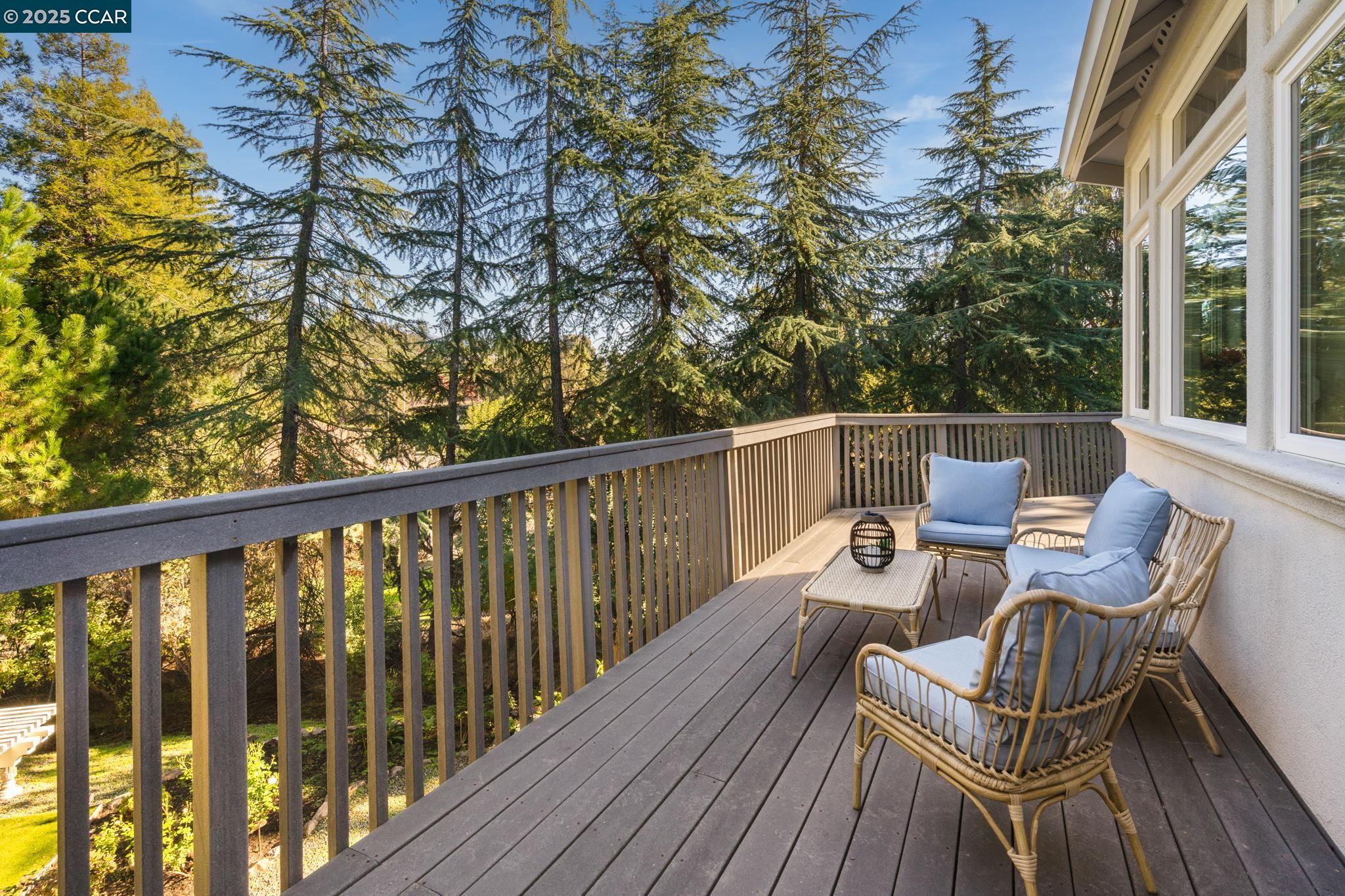 471 El Rio Danville, CA 94526 - Photo 40 of 51 a view of balcony with wooden floor and outdoor seating