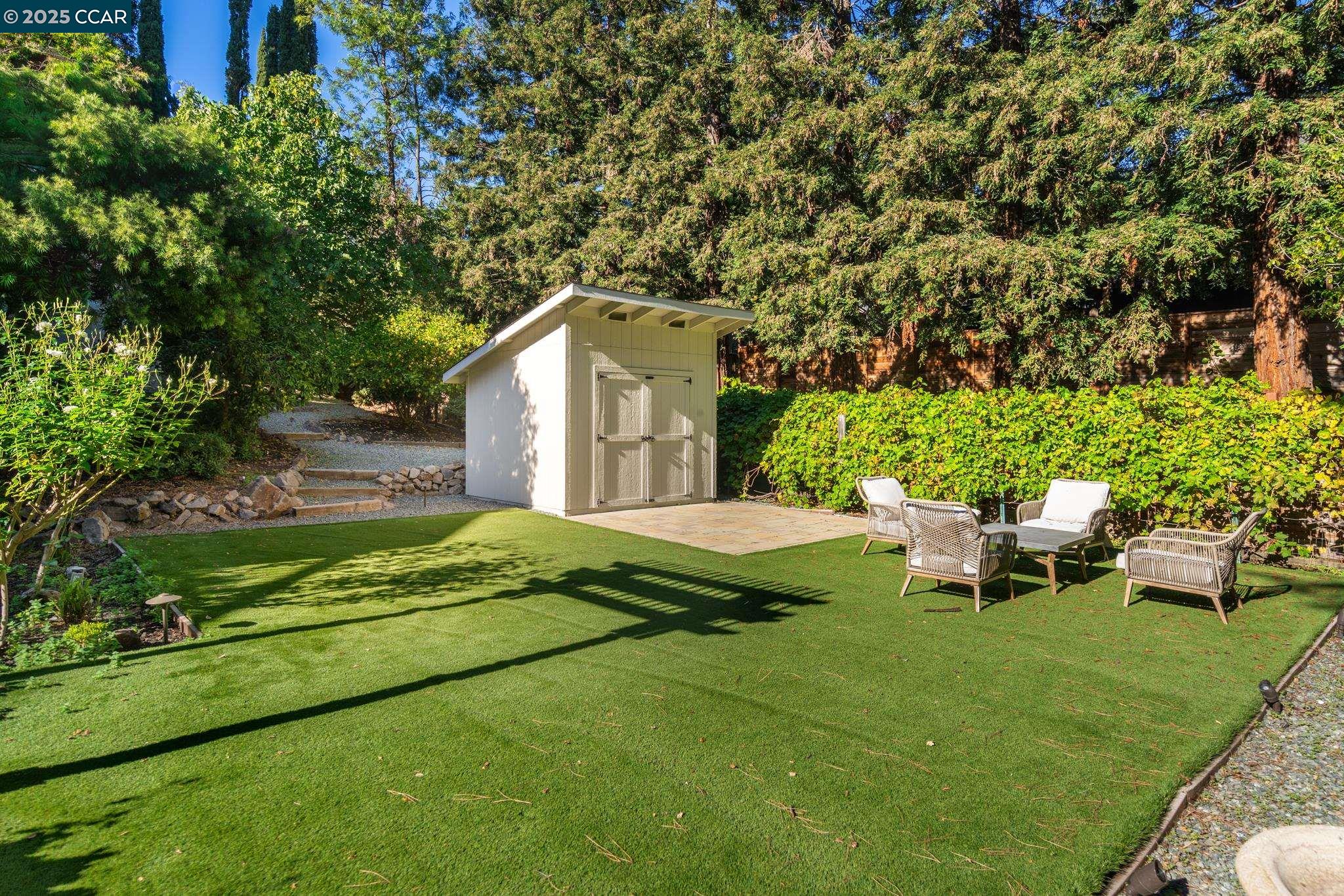471 El Rio Danville, CA 94526 - Photo 43 of 51 a view of an house with backyard space and garden