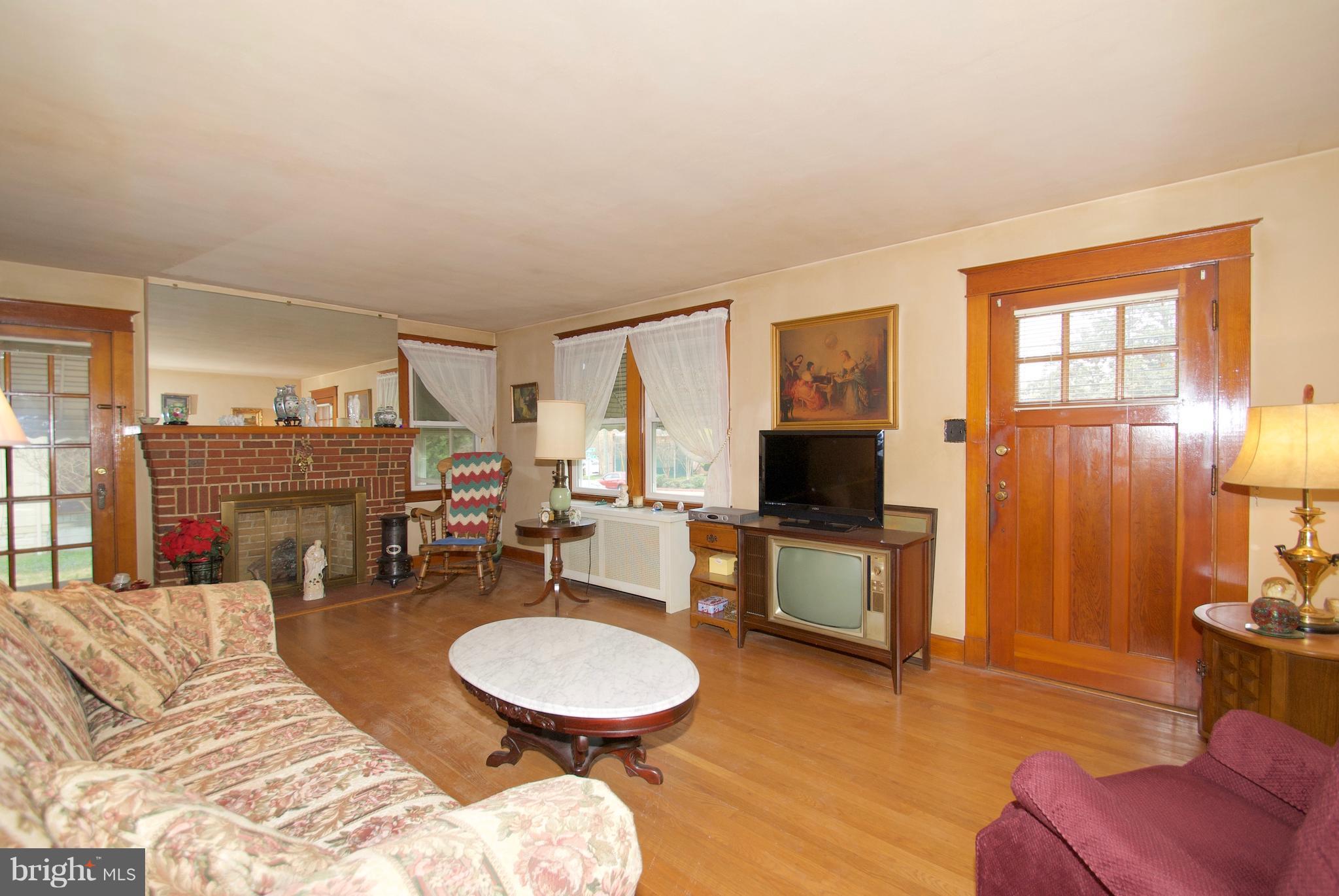 1211 Bay Ridge Avenue Annapolis, MD 21403 - Photo 9 of 30 Light-Filled Living Room with French Door to Porch