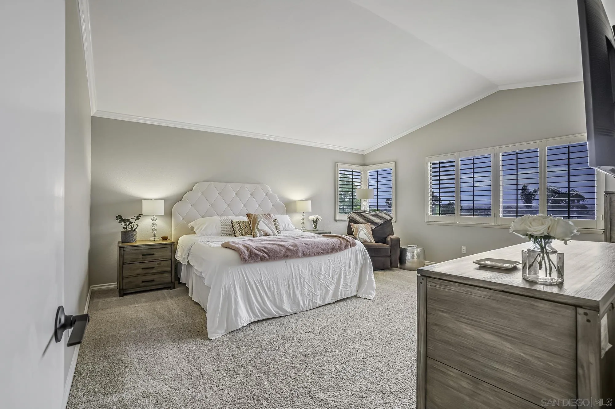 1848 Avenida Mimosa Encinitas, CA 92024 - Photo 13 of 35 a bedroom with a bed and wooden floor