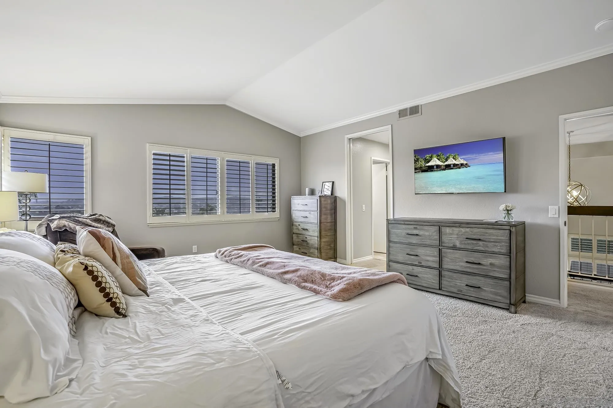 1848 Avenida Mimosa Encinitas, CA 92024 - Photo 14 of 35 a bedroom with a bed and furniture