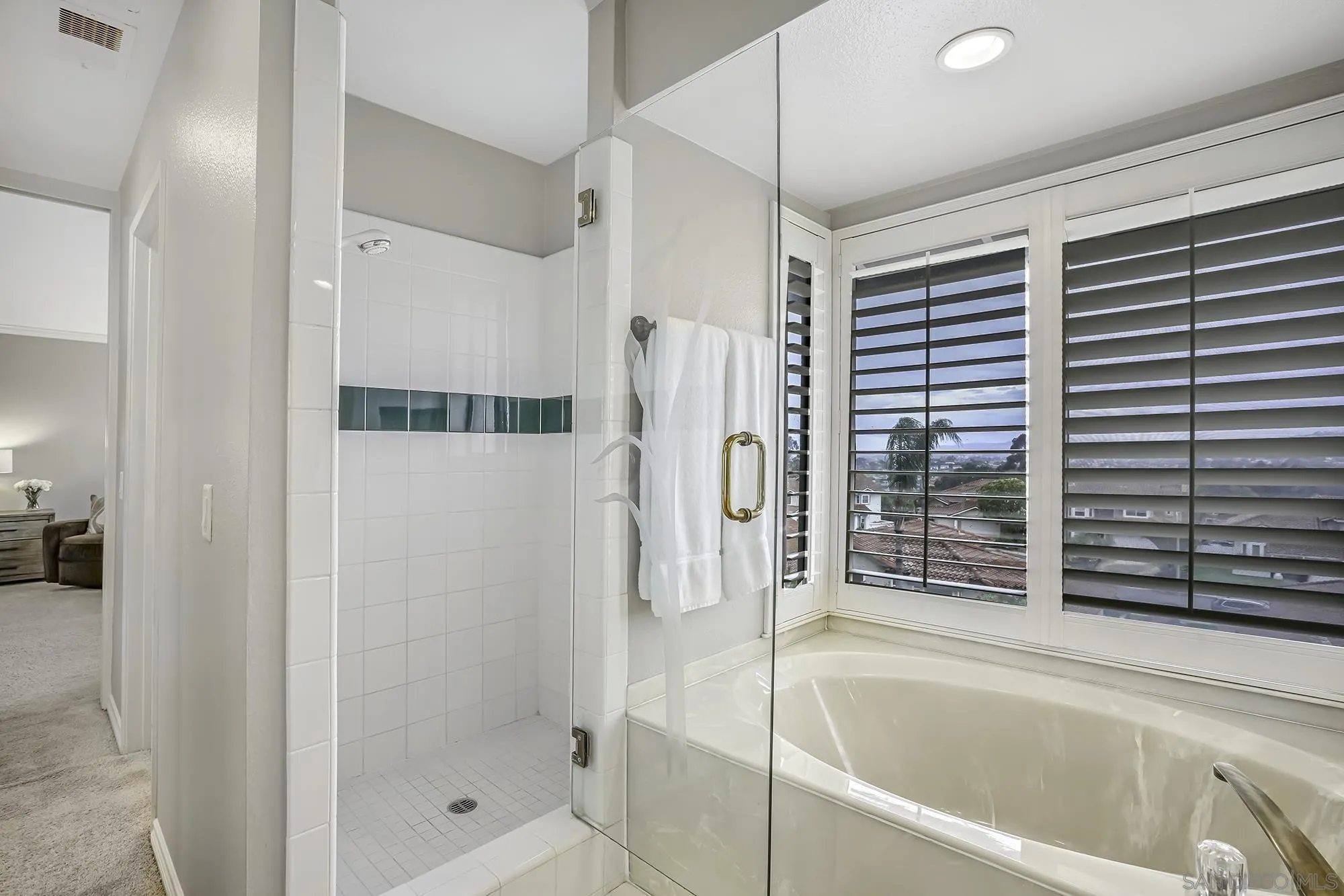 1848 Avenida Mimosa Encinitas, CA 92024 - Photo 16 of 35 a bathroom with a bathtub and a shower