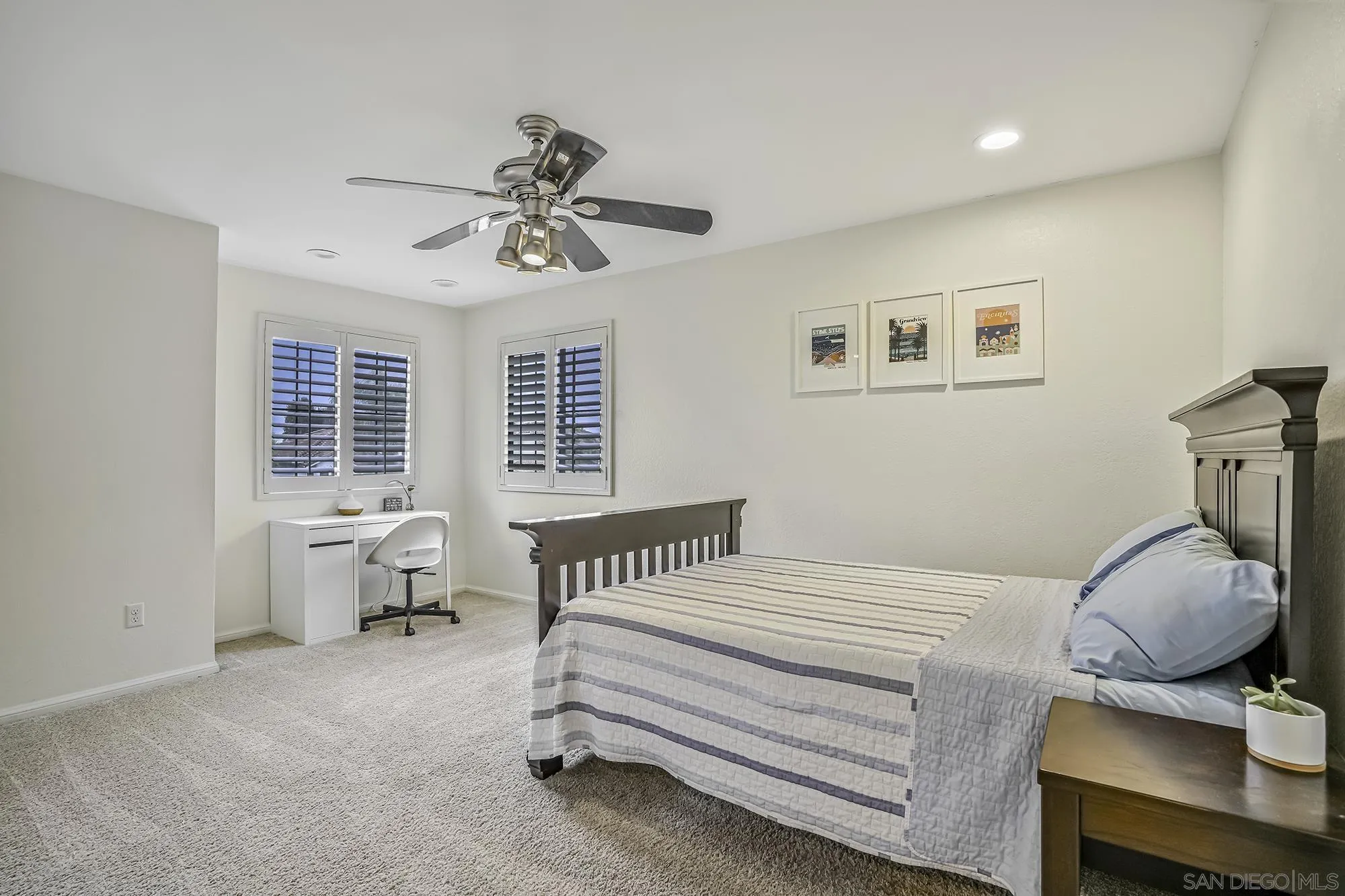 1848 Avenida Mimosa Encinitas, CA 92024 - Photo 17 of 35 a bedroom with a bed and wooden floor