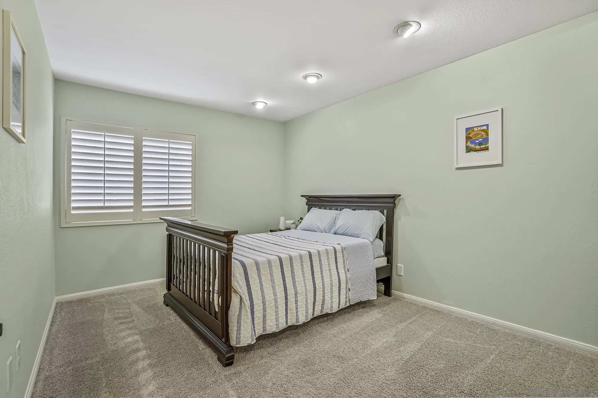 1848 Avenida Mimosa Encinitas, CA 92024 - Photo 18 of 35 a bedroom with a bed and a window