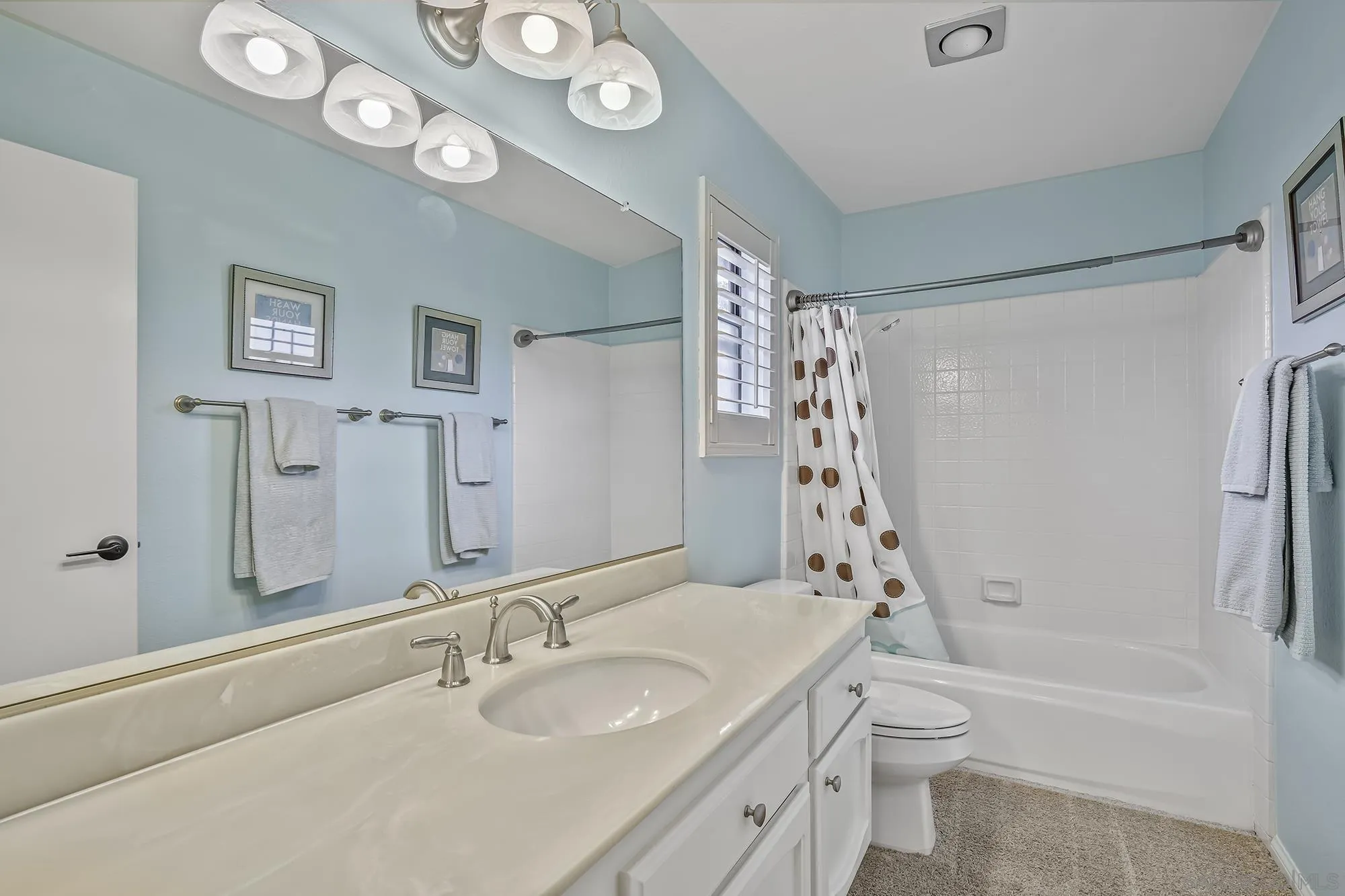 1848 Avenida Mimosa Encinitas, CA 92024 - Photo 19 of 35 a bathroom with a granite countertop sink a toilet and a bathtub