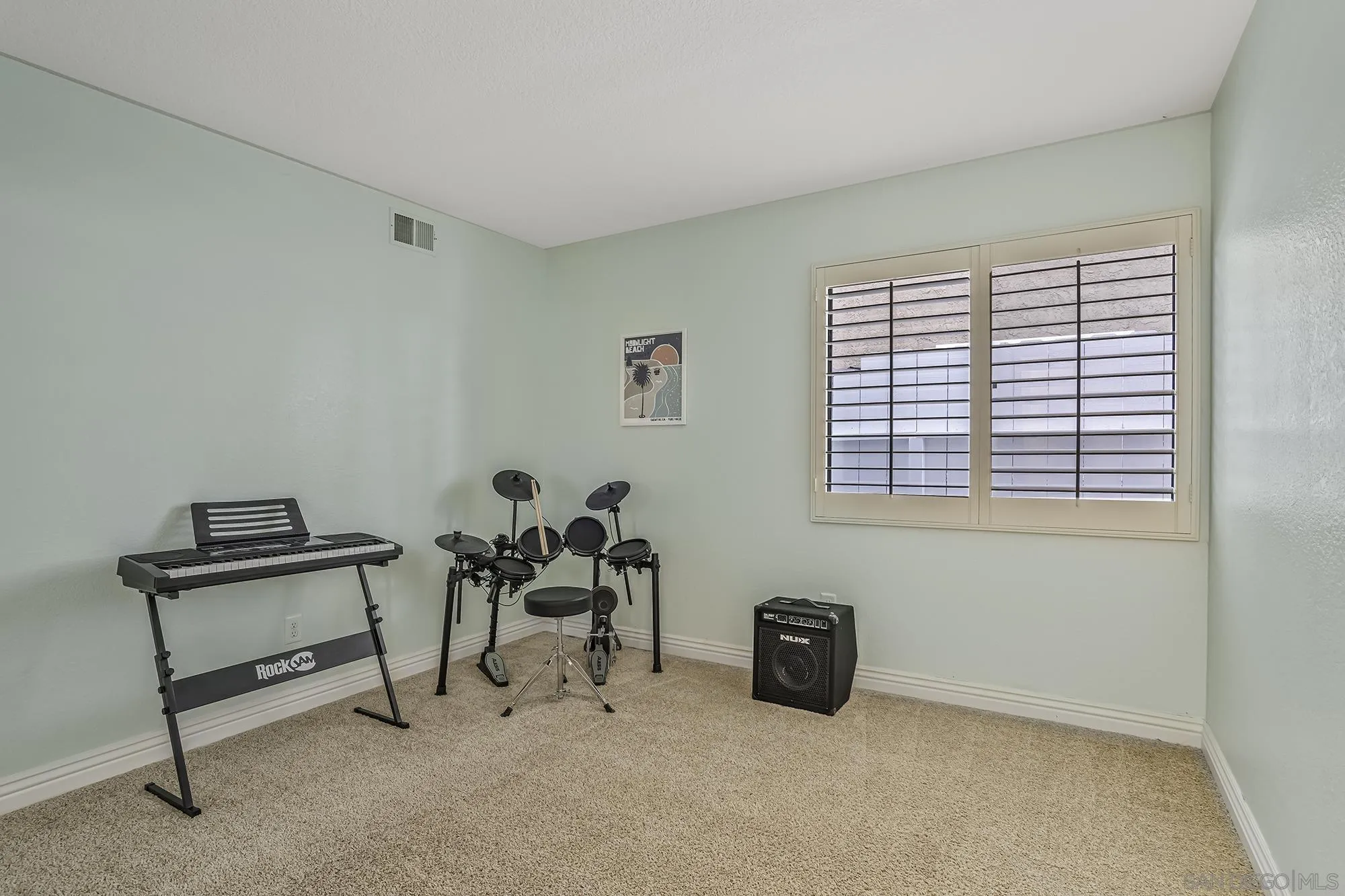 1848 Avenida Mimosa Encinitas, CA 92024 - Photo 20 of 35 a work room with furniture a rug and a window