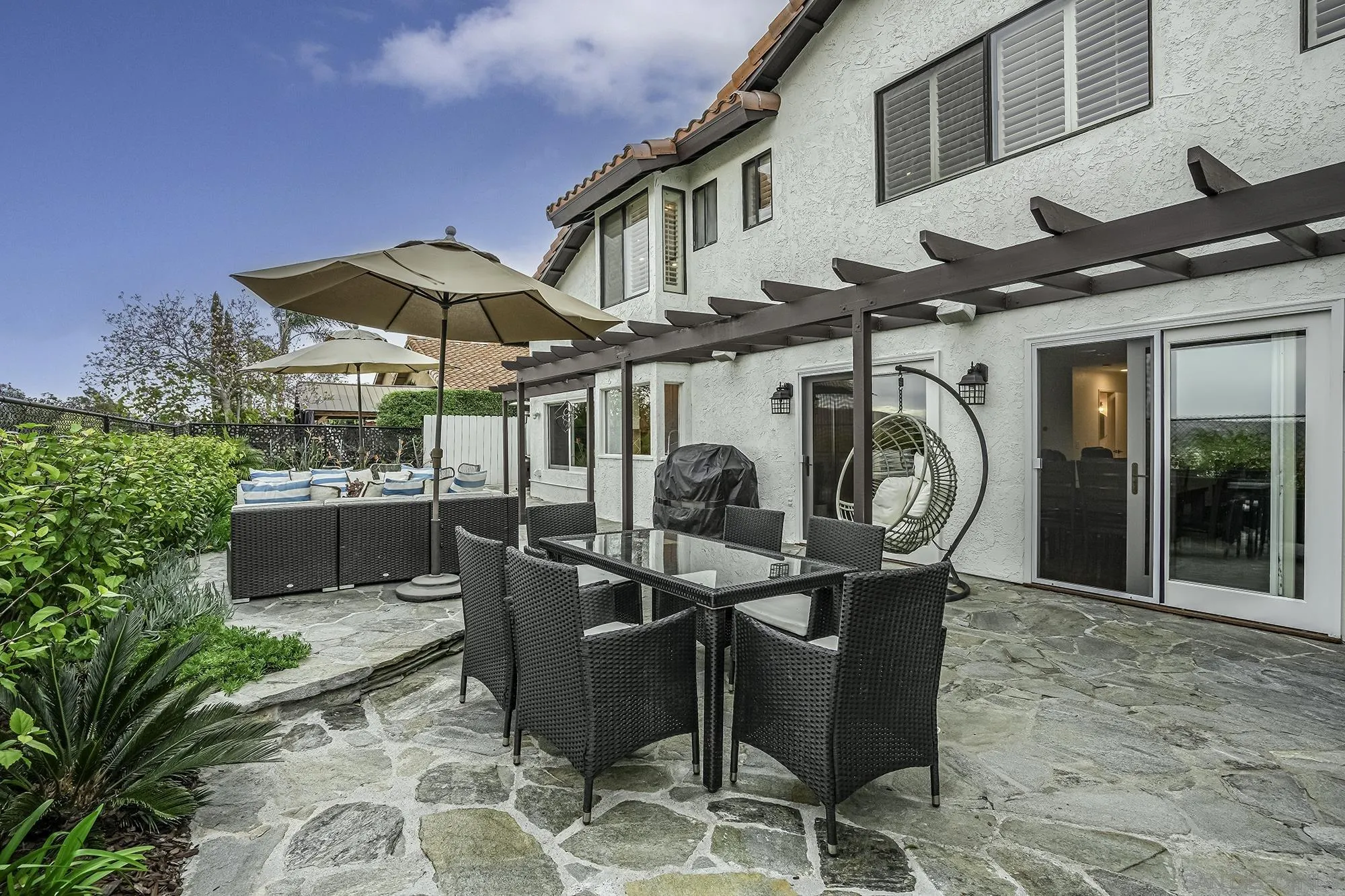 1848 Avenida Mimosa Encinitas, CA 92024 - Photo 25 of 35 a front view of a house with table and chairs