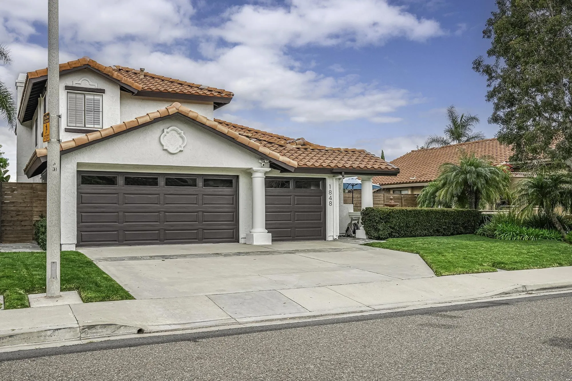1848 Avenida Mimosa Encinitas, CA 92024 - Photo 34 of 35 front view of a house with a yard