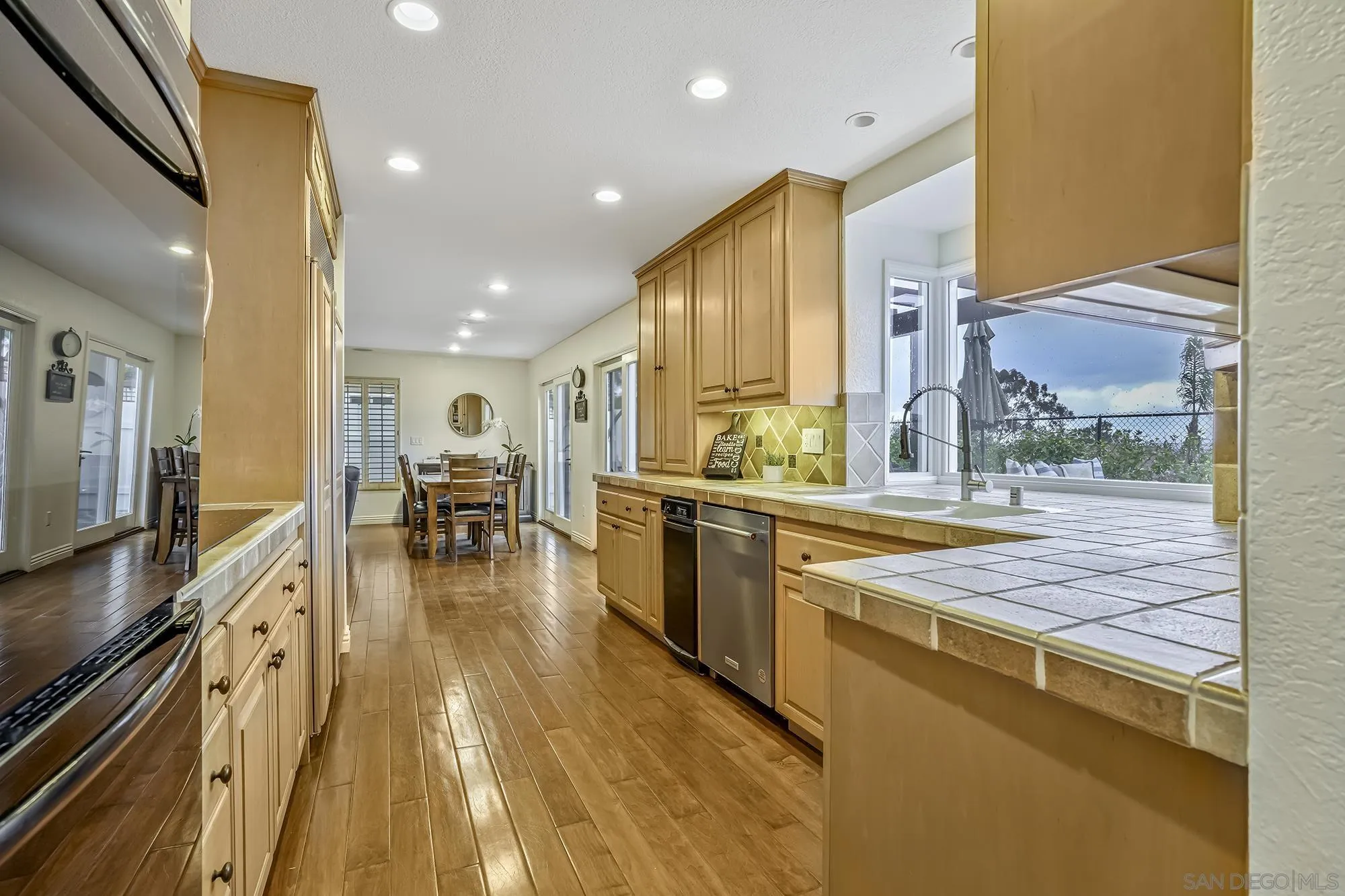 1848 Avenida Mimosa Encinitas, CA 92024 - Photo 9 of 35 a very nice looking kitchen with a large window