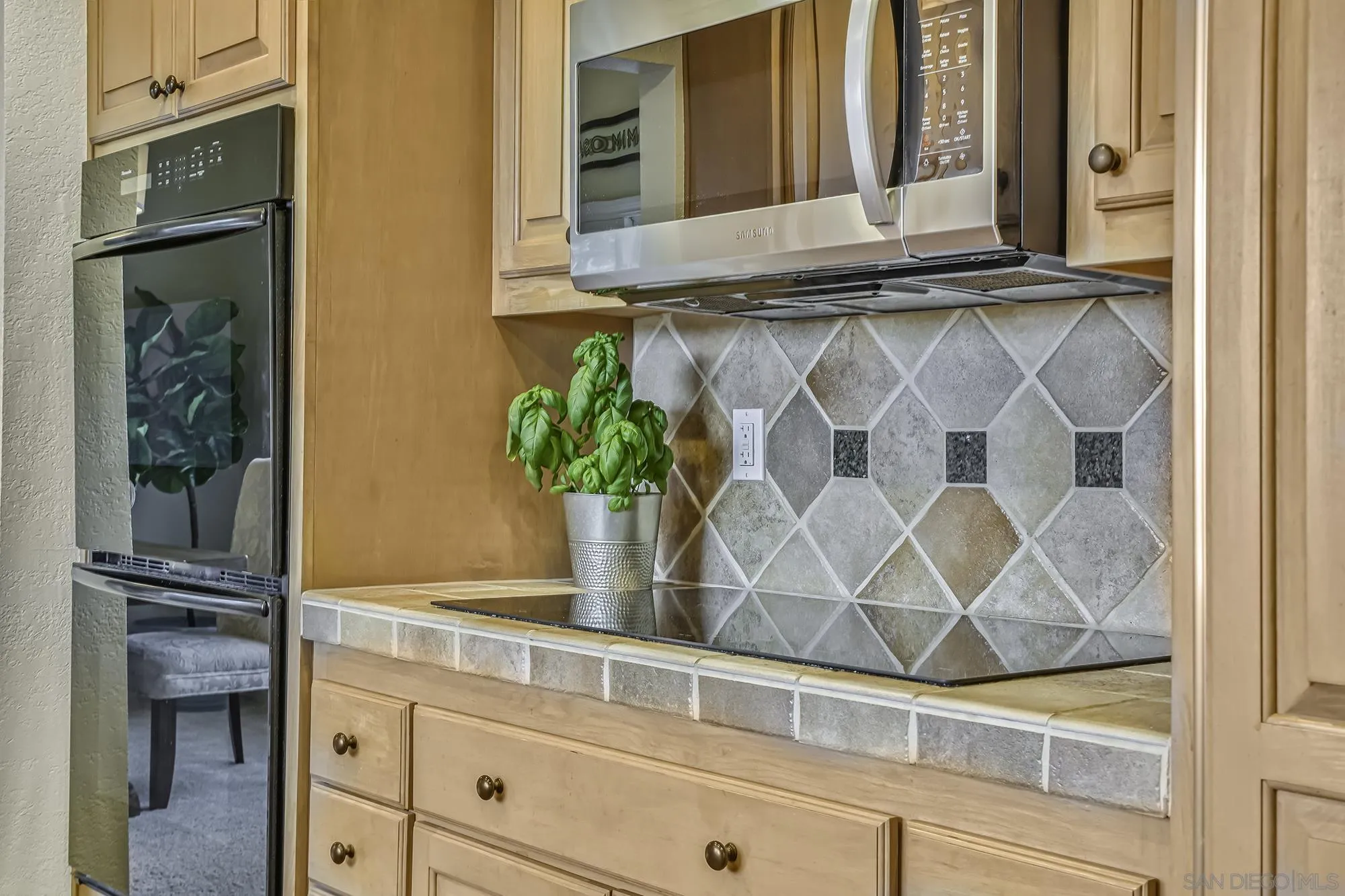 1848 Avenida Mimosa Encinitas, CA 92024 - Photo 10 of 35 a bathroom with a sink and a mirror