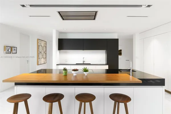 a view of a livingroom with furniture and window