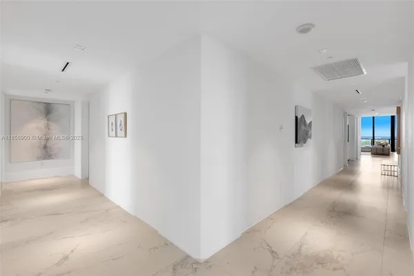 a bedroom with a bed and a mirror