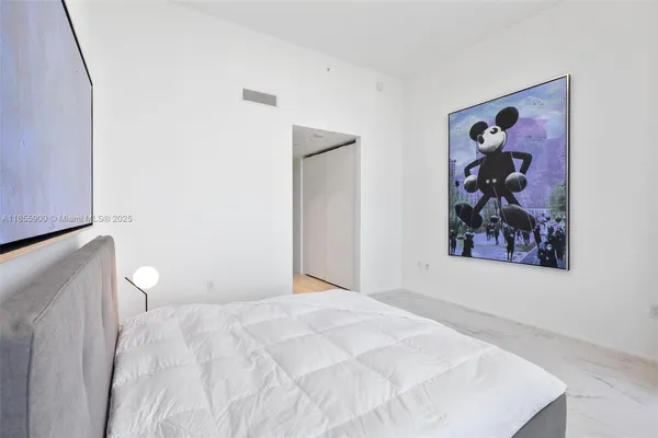 a bathroom with a sink a toilet and bathtub