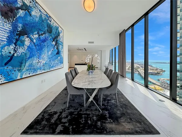 a view of a workspace with furniture