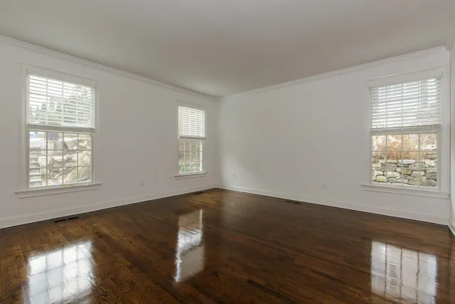 a view of an empty room and window