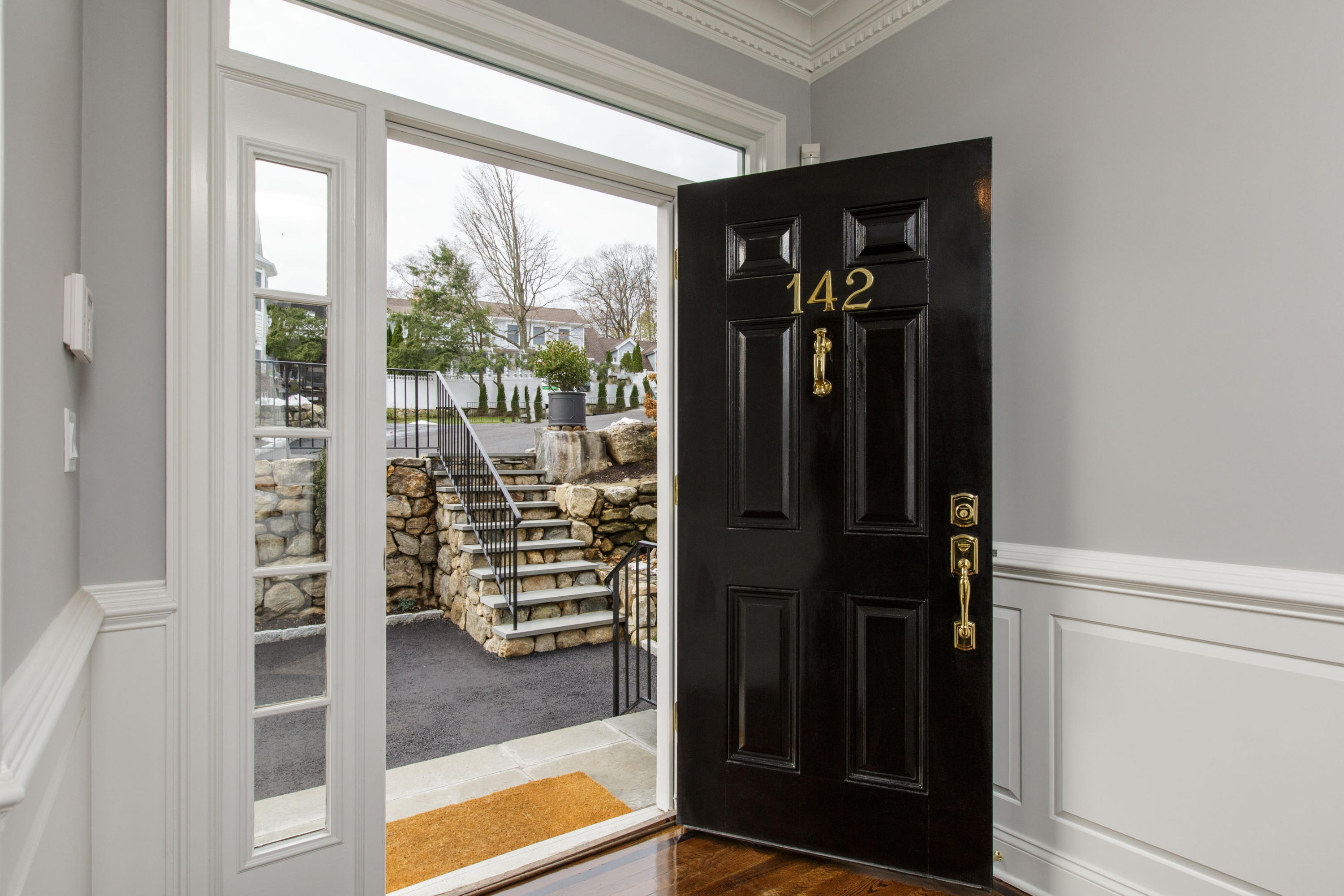 142 Harrison Avenue New Canaan, CT 06840 - Photo 4 of 30 a view of walk in closet with clothes and shoes