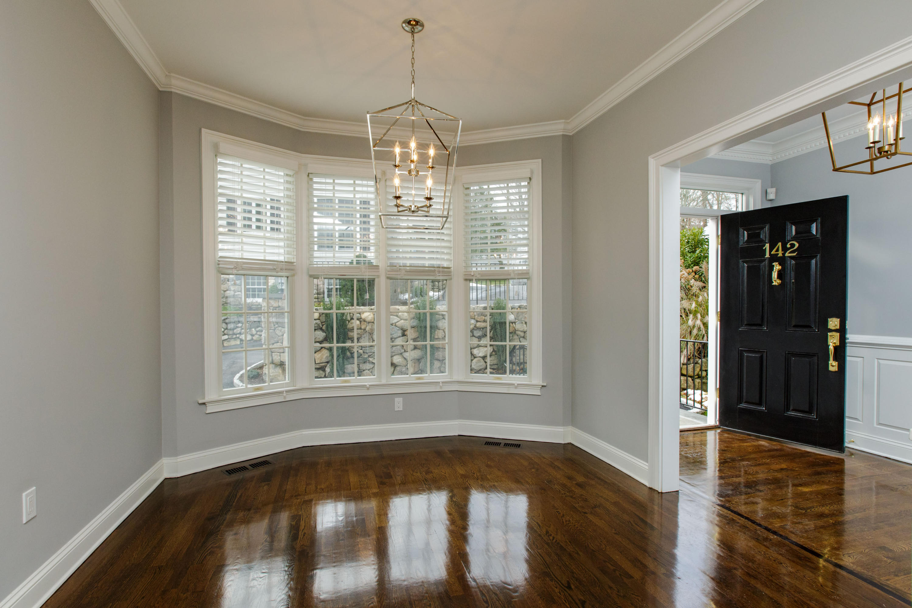 142 Harrison Avenue New Canaan, CT 06840 - Photo 10 of 30 a view of empty room with wooden floor and fan