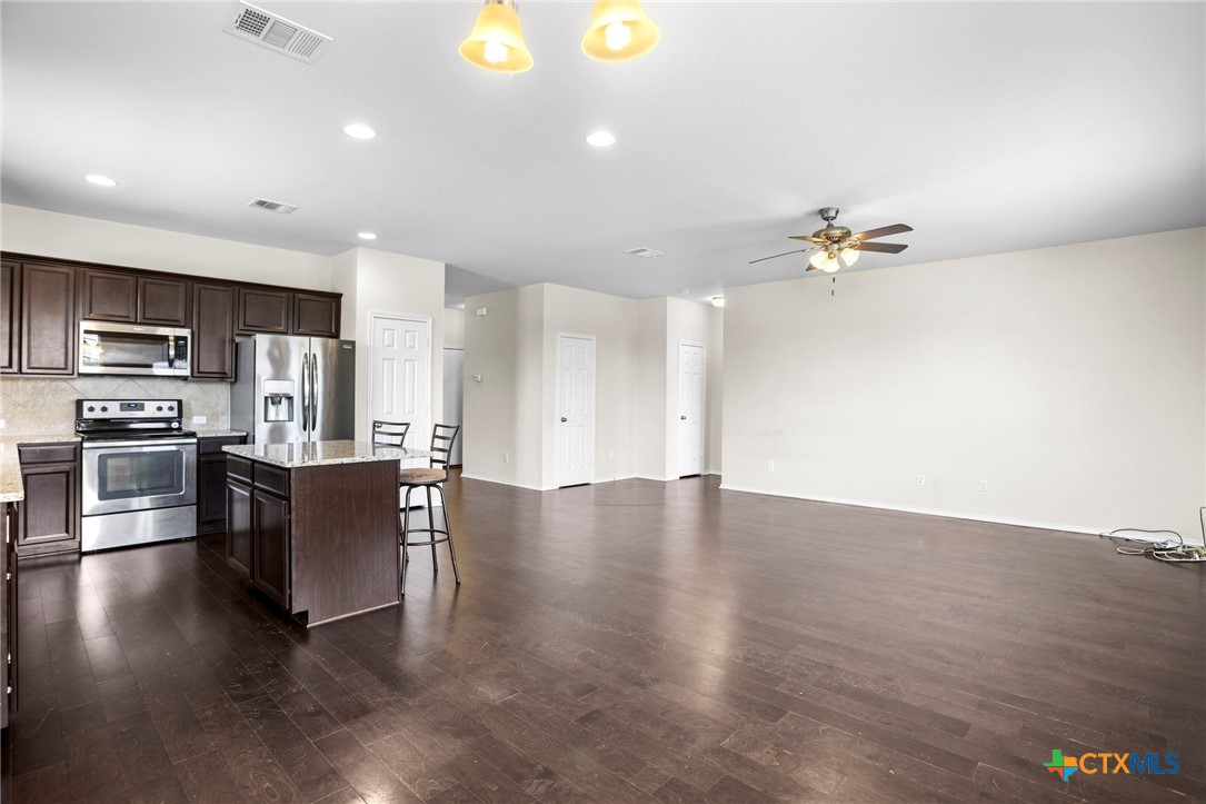 1203 Daffodil Drive Temple, TX 76502 - Photo 11 of 30 a view of kitchen with sink and refrigerator