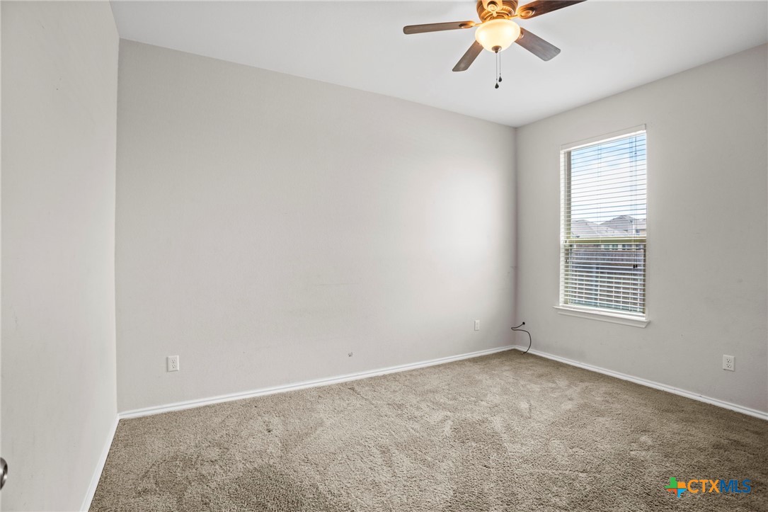 1203 Daffodil Drive Temple, TX 76502 - Photo 18 of 30 a view of an empty room with a window