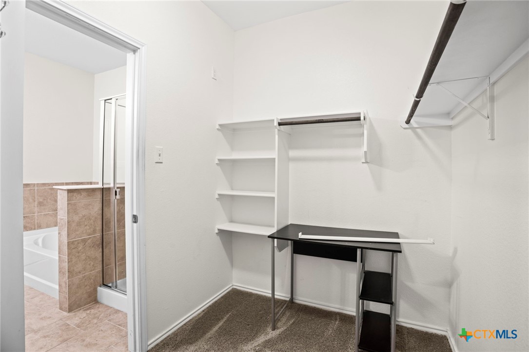 1203 Daffodil Drive Temple, TX 76502 - Photo 26 of 30 a room with storage and utility