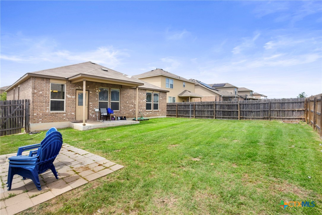 1203 Daffodil Drive Temple, TX 76502 - Photo 28 of 30 a view of a house with a backyard