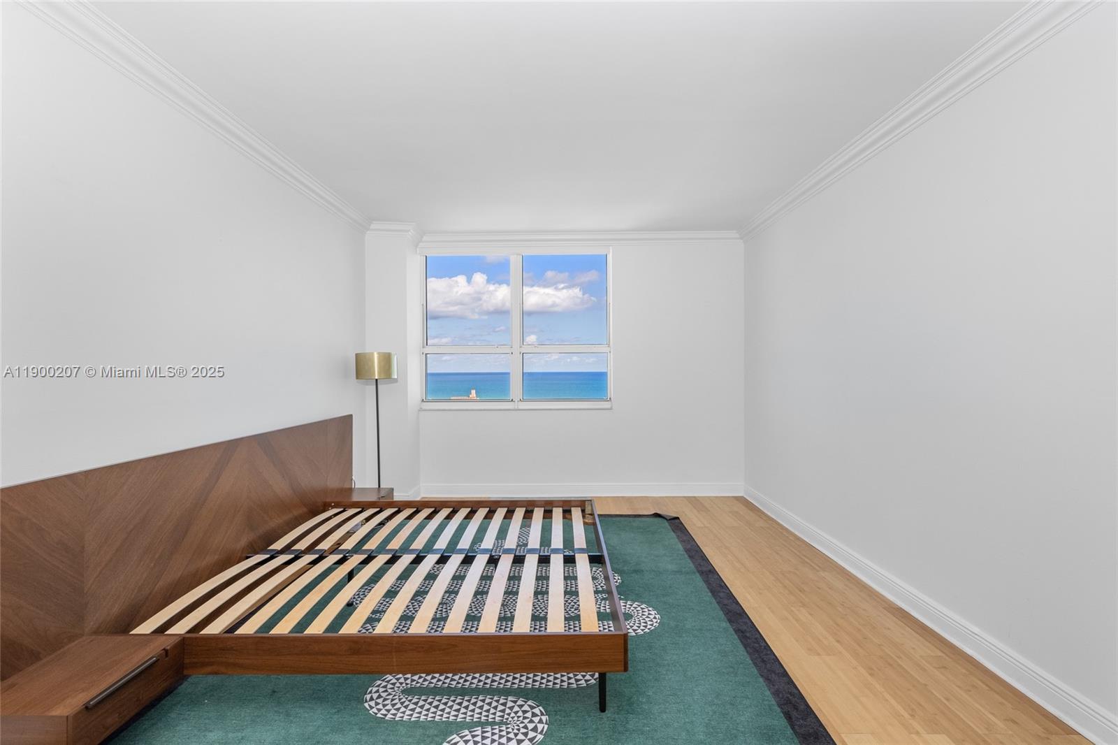 650 West Avenue, Unit PH12 Miami Beach, FL 33139 - Photo 18 of 37 a room with bed and a window