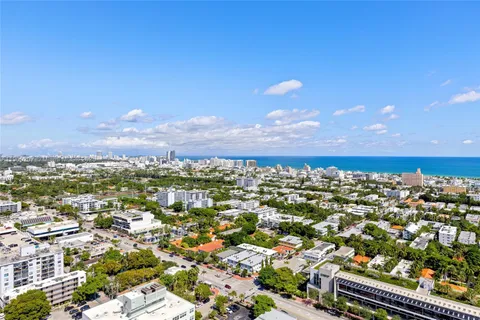 a view of city with ocean
