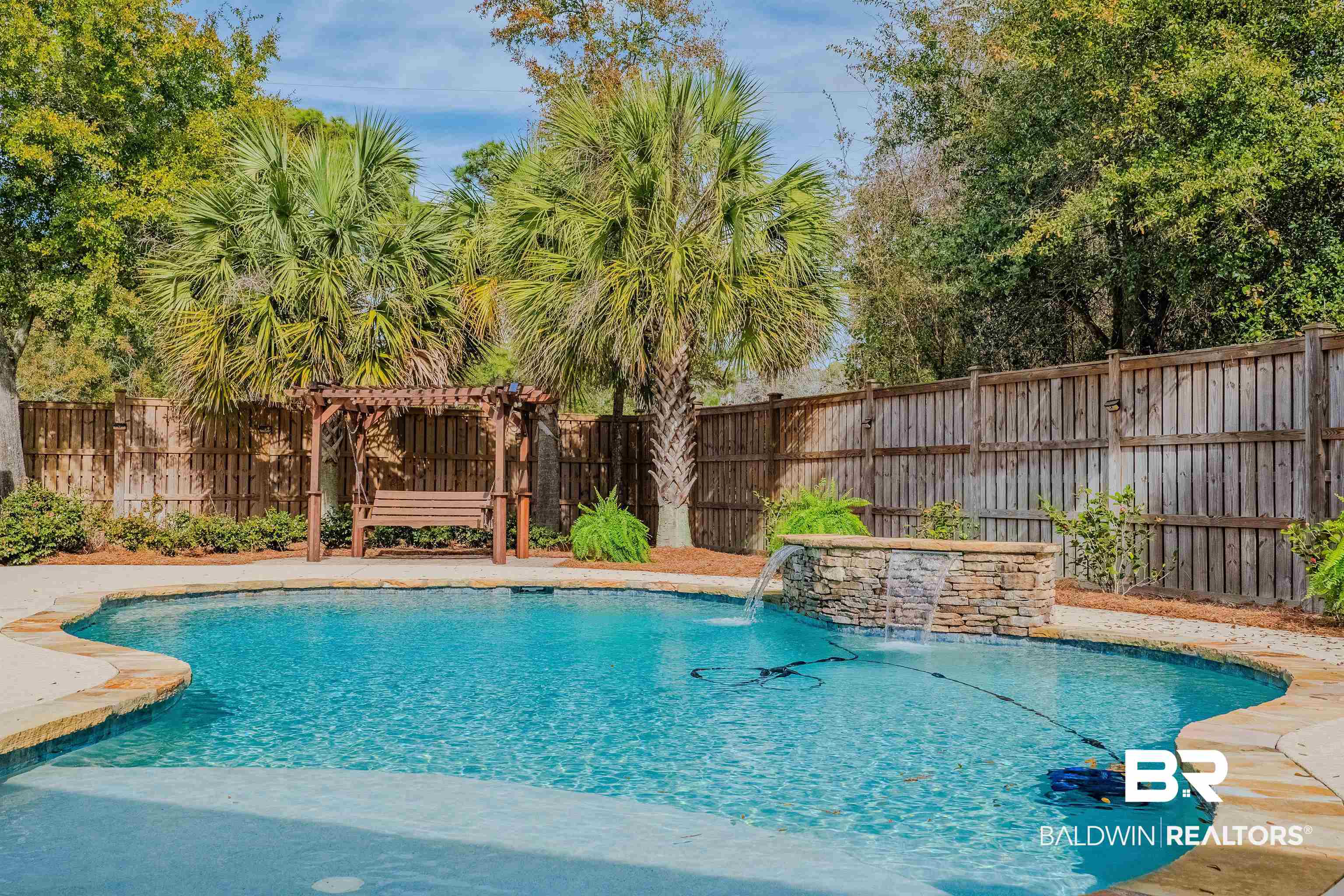 708 Manning Place Fairhope, AL 36532 - Photo 45 of 58 View of swimming pool featuring pool water feature and a pergola