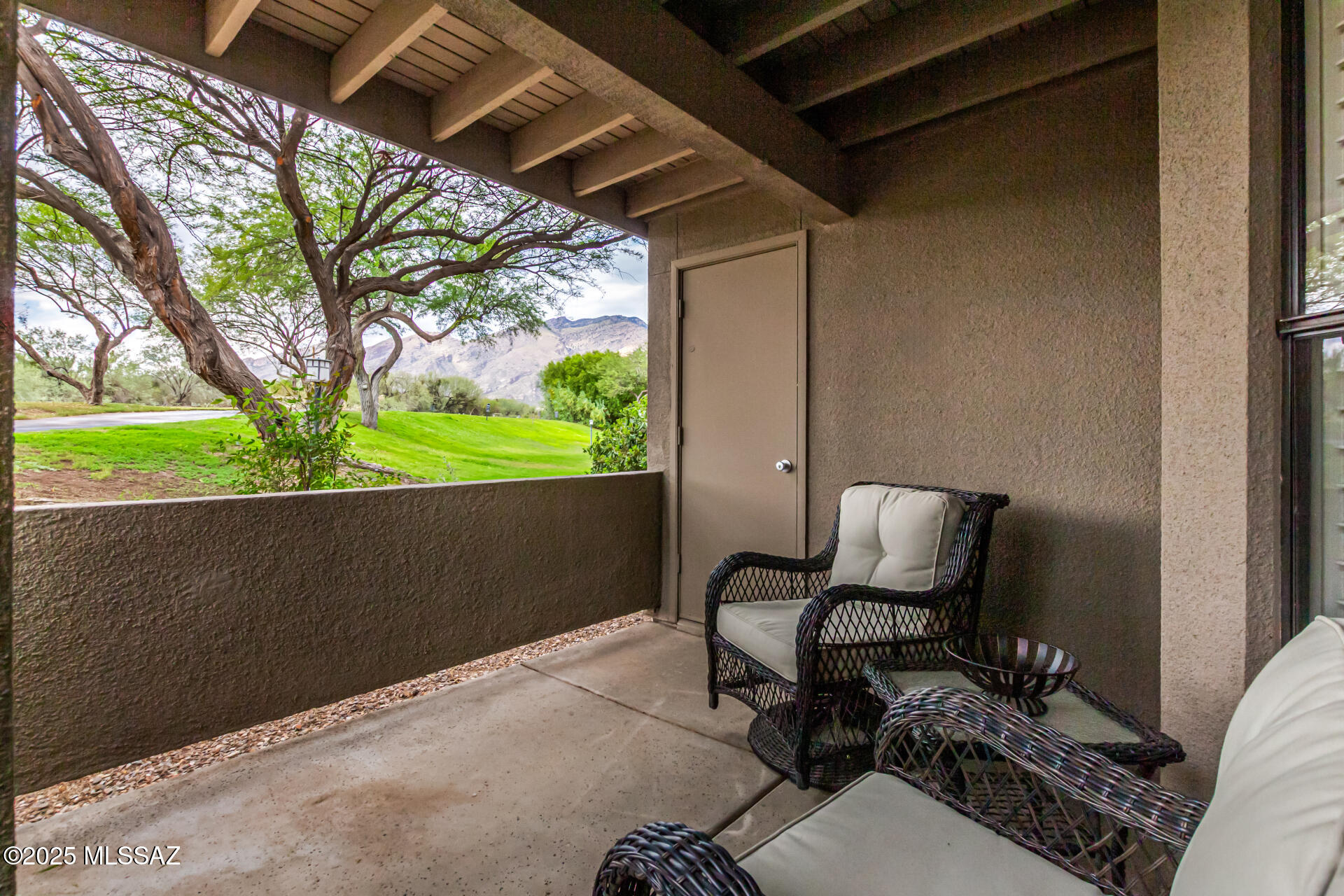 5855 North Kolb Road, Unit 8102 Tucson, AZ 85750 - Photo 1 of 28 a view of chair and table in the balcony