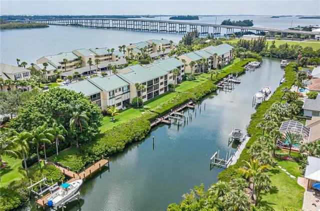 an aerial view of a city with lake view