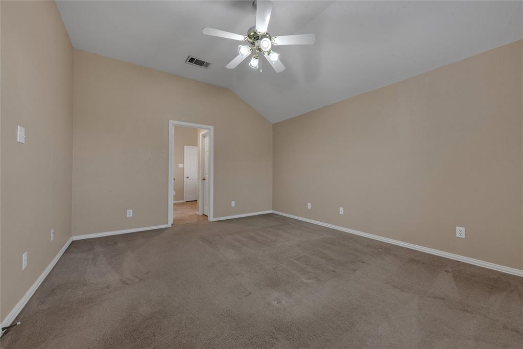 910 Derby Court Celina, TX 75009 - Photo 15 of 27 a view of an empty room with a fan