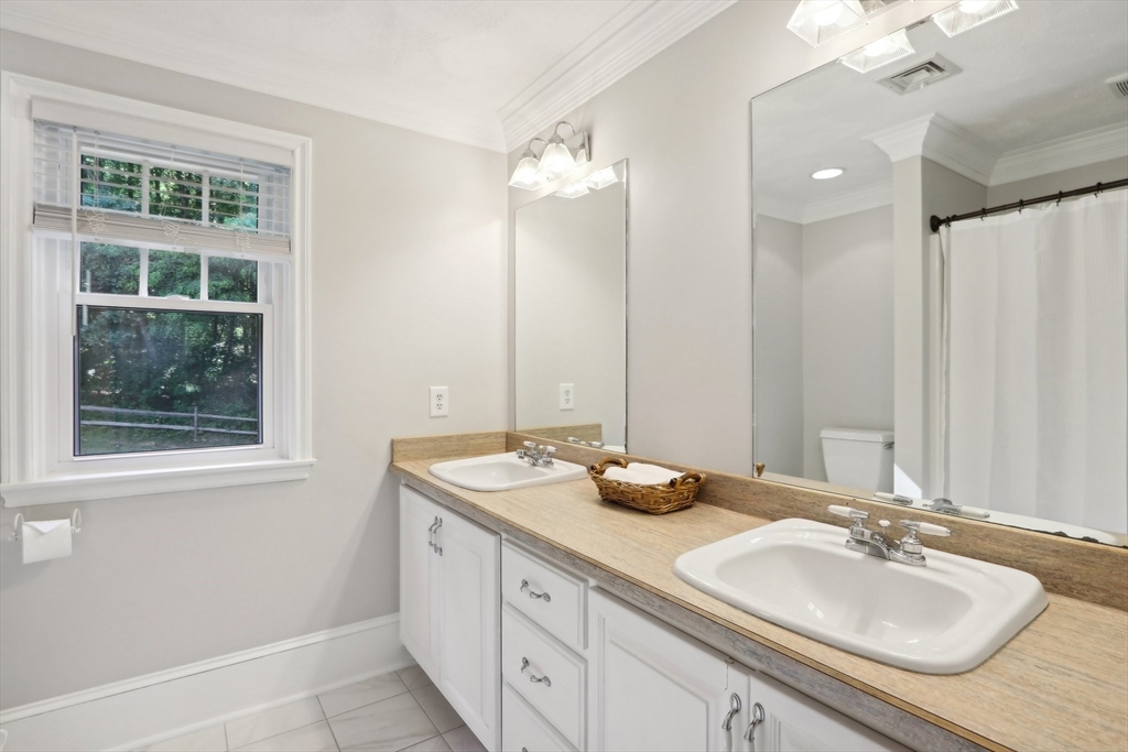 12 Spring Hill Road Merrimac, MA 01860 - Photo 20 of 42 a bathroom with a granite countertop sink and a mirror