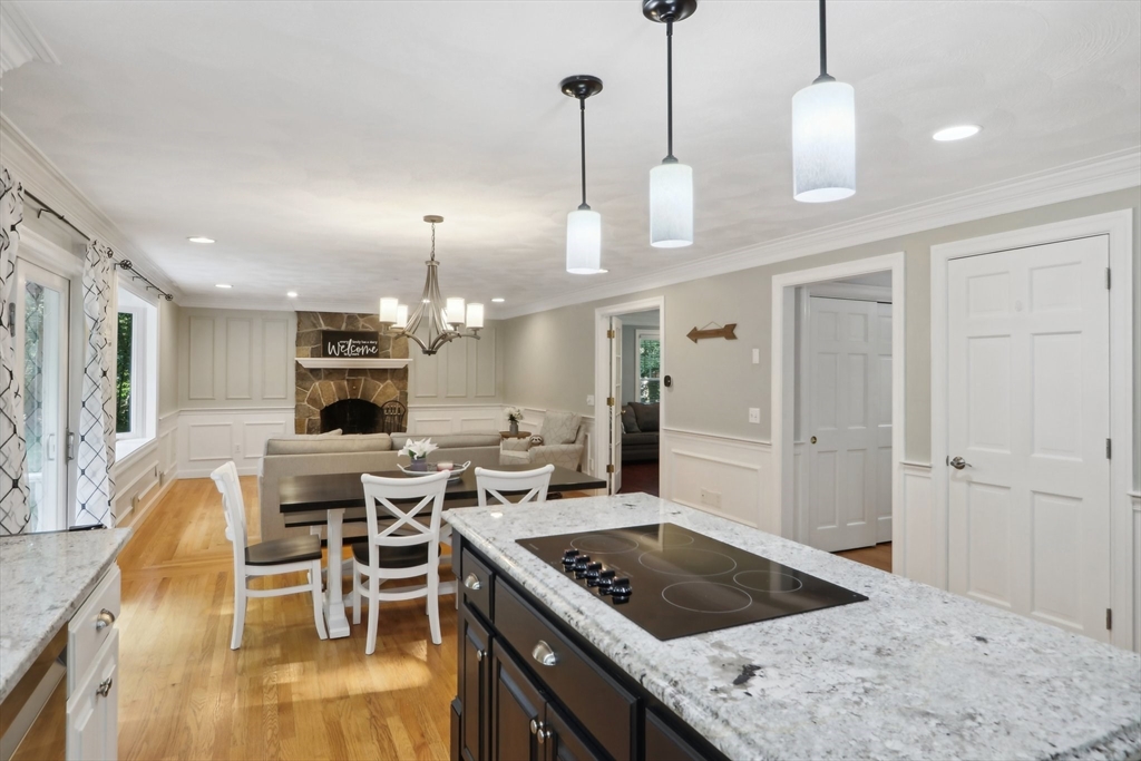 12 Spring Hill Road Merrimac, MA 01860 - Photo 6 of 42 a kitchen with kitchen island a large counter top space appliances and cabinets