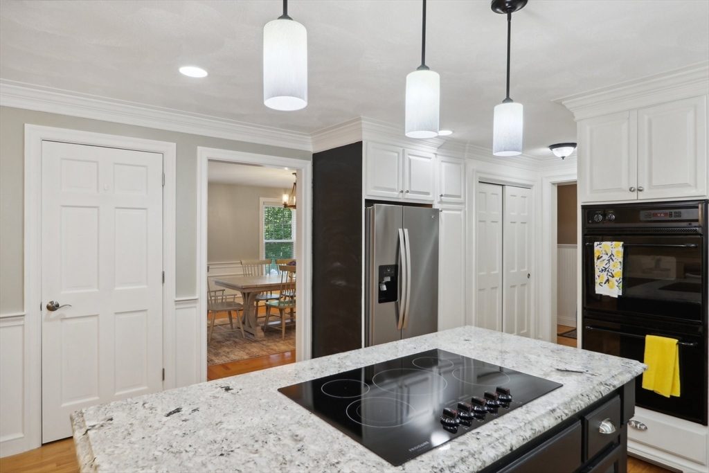 12 Spring Hill Road Merrimac, MA 01860 - Photo 7 of 42 a kitchen with stainless steel appliances granite countertop a refrigerator a stove and a sink
