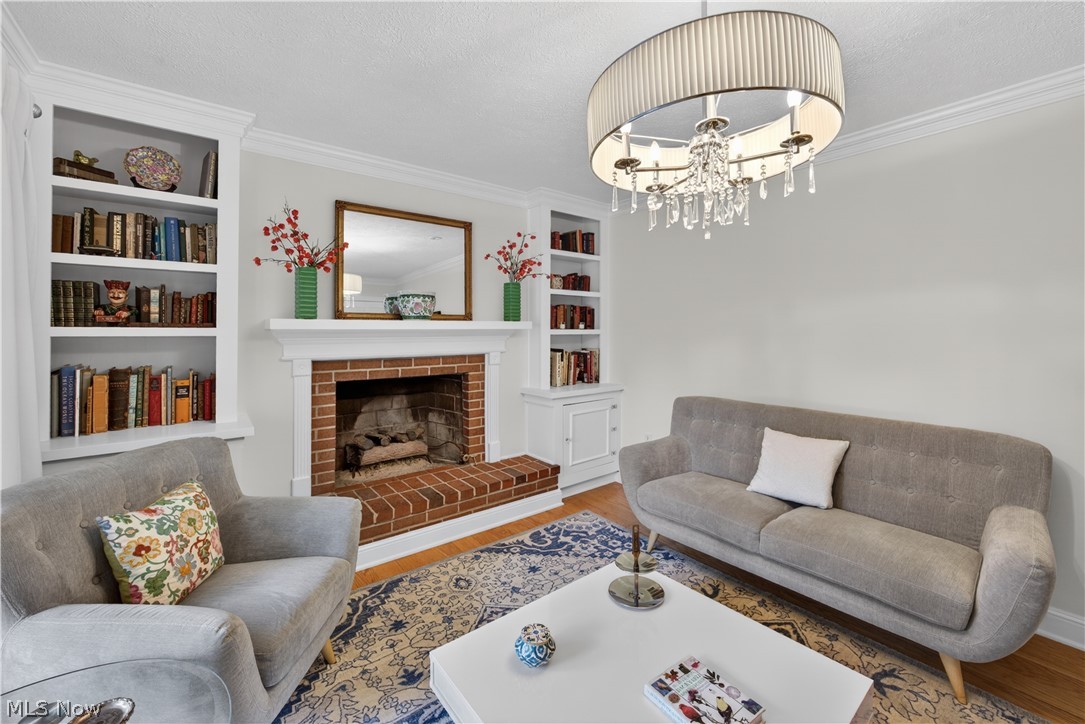 2069 Middleton Road Hudson, OH 44236 - Photo 5 of 42 The Living Room with cozy gas fireplace complete with white wood cabinetry either side