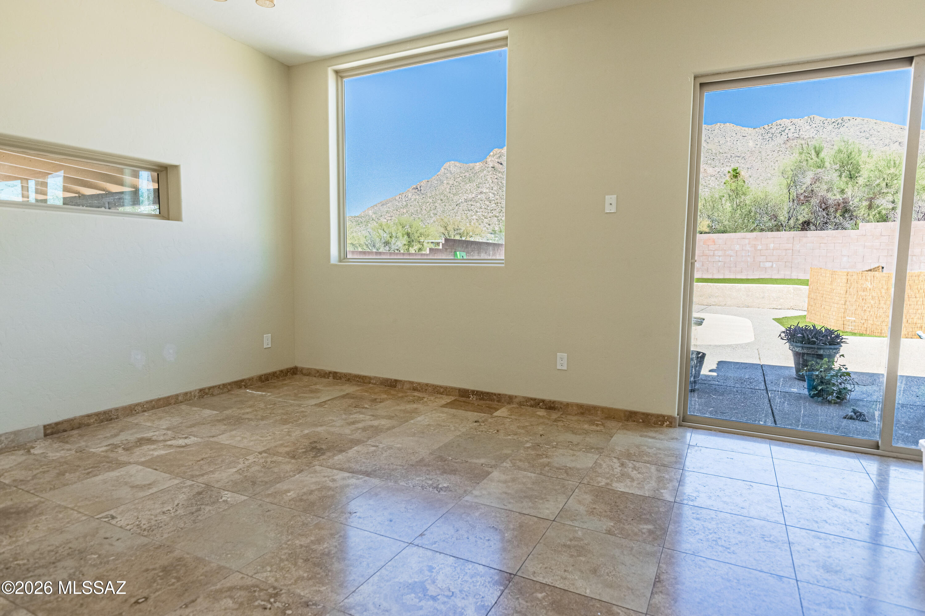 545 East Rancho Catalina Place Tucson, AZ 85704 - Photo 8 of 13 a view of an empty room with a window
