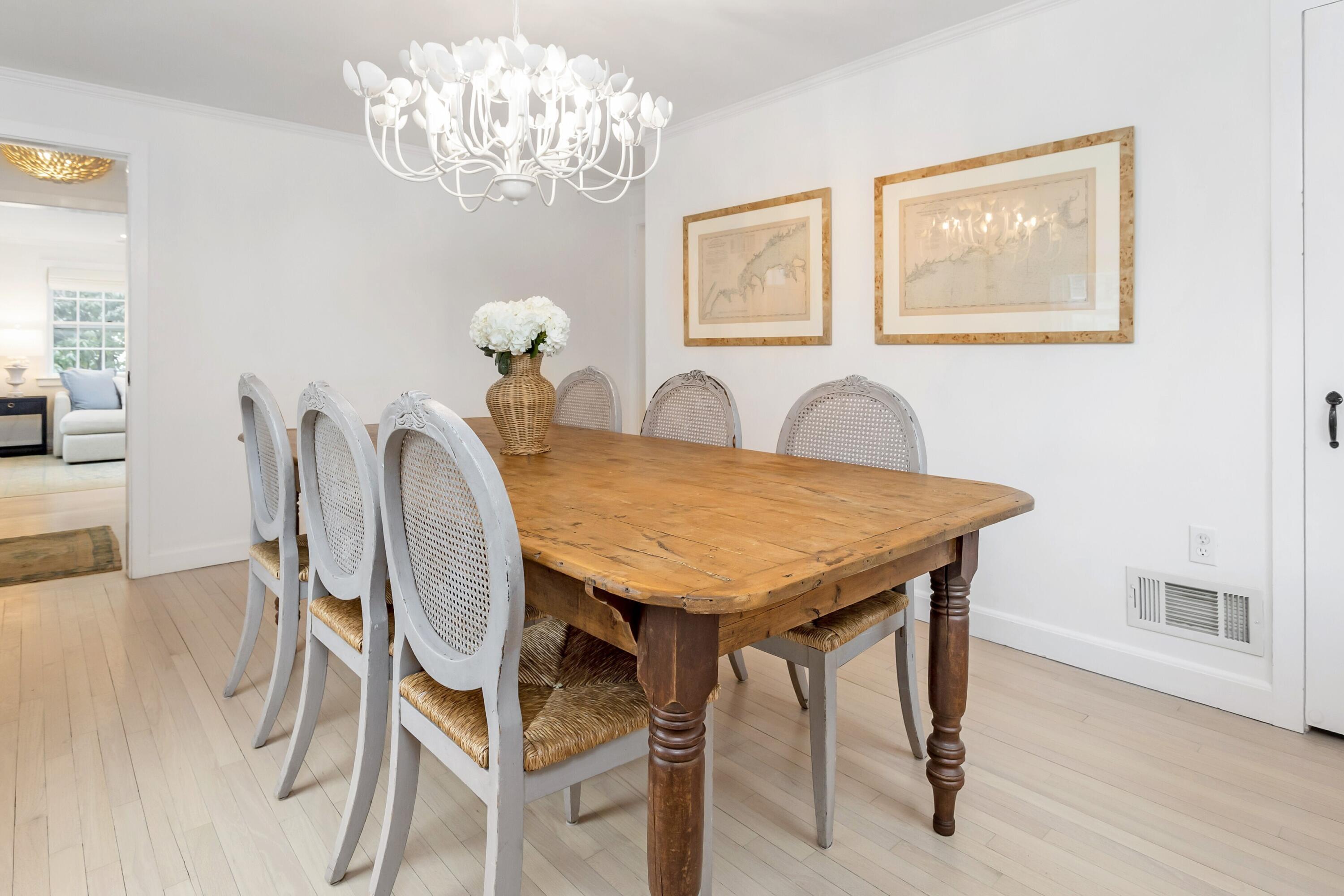 22 Intervale Road Darien, CT 06820 - Photo 12 of 37 a view of a dining room with furniture and chandelier