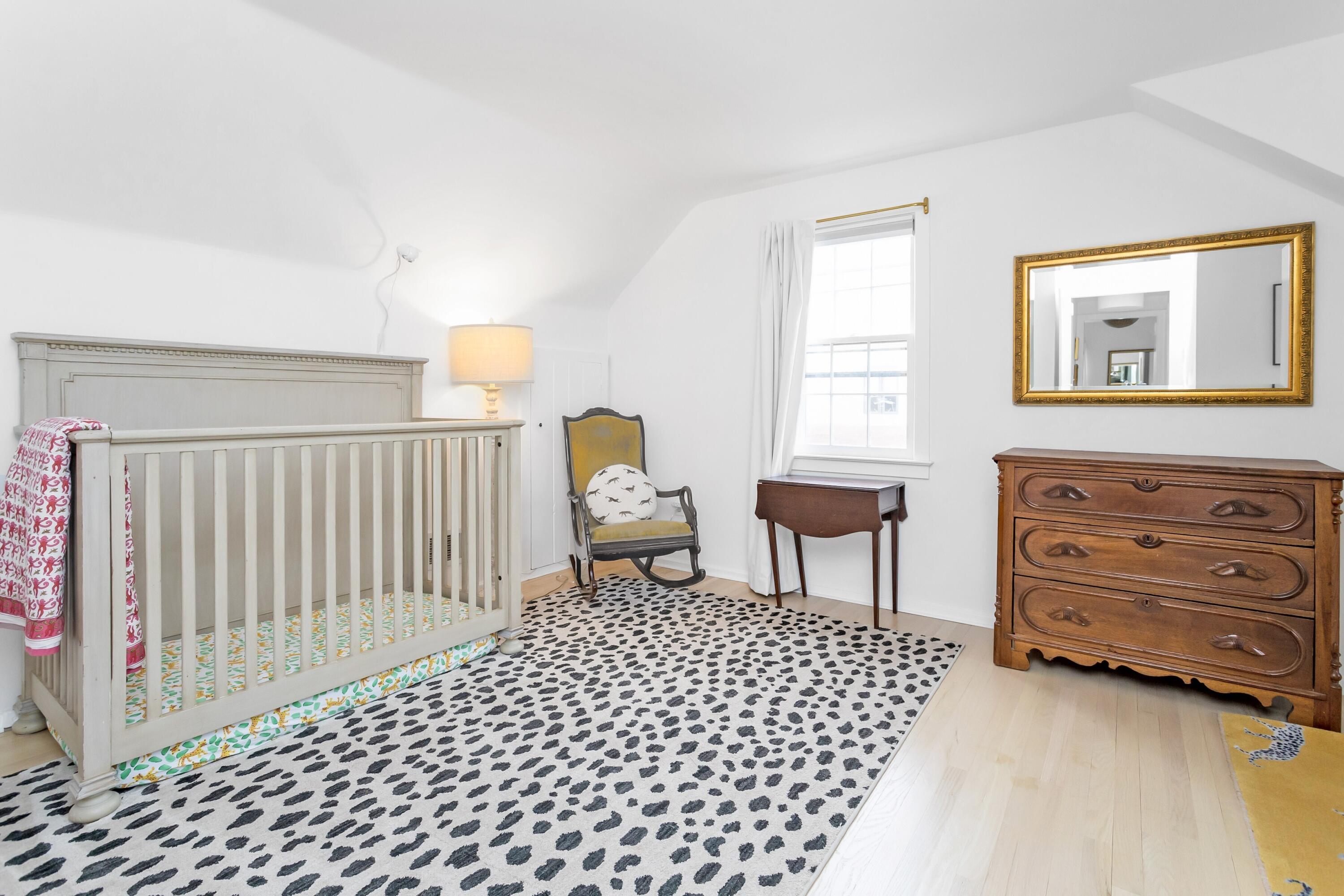 22 Intervale Road Darien, CT 06820 - Photo 23 of 37 a bedroom with a bed and a window
