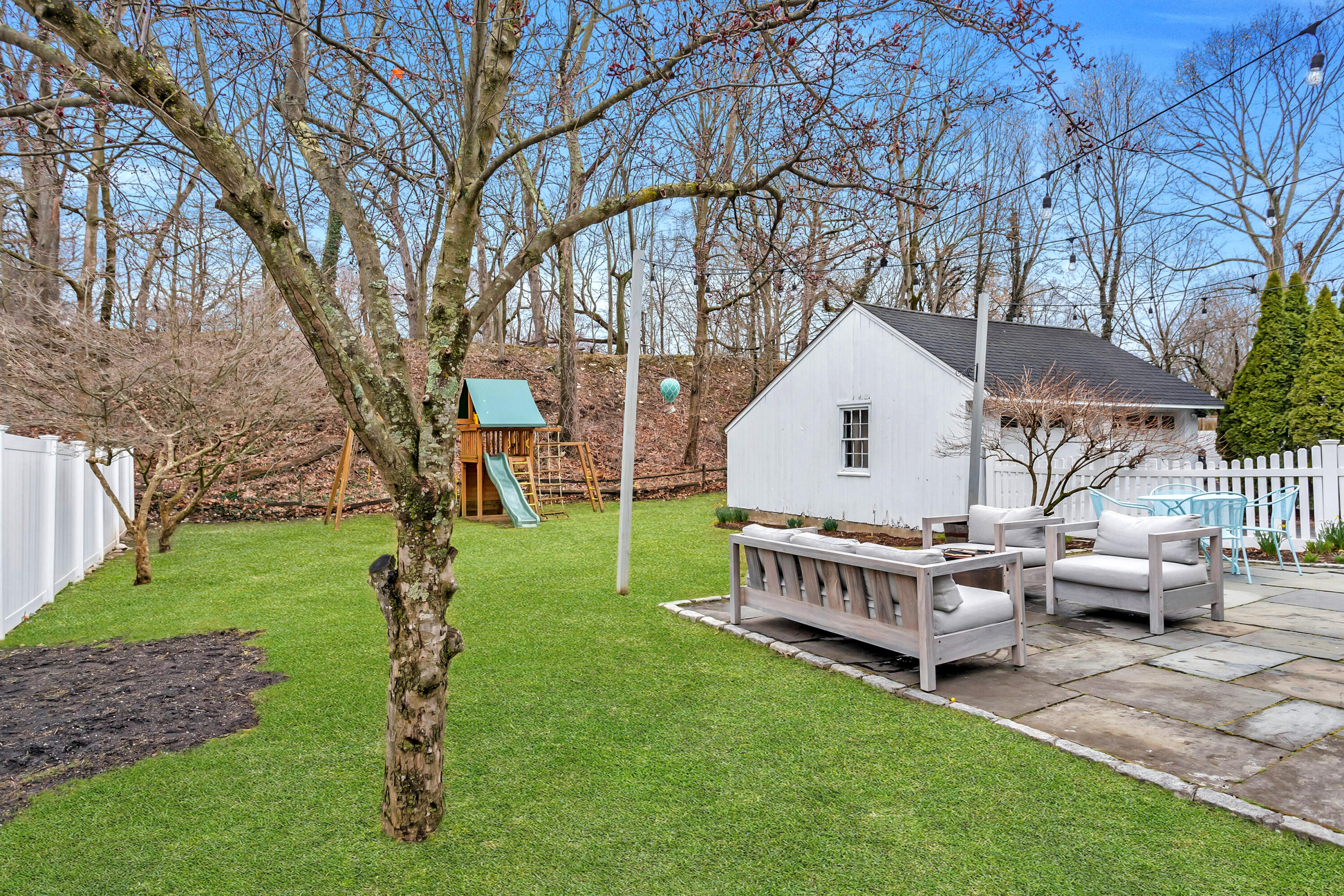 22 Intervale Road Darien, CT 06820 - Photo 29 of 37 a view of a house with a yard and deck