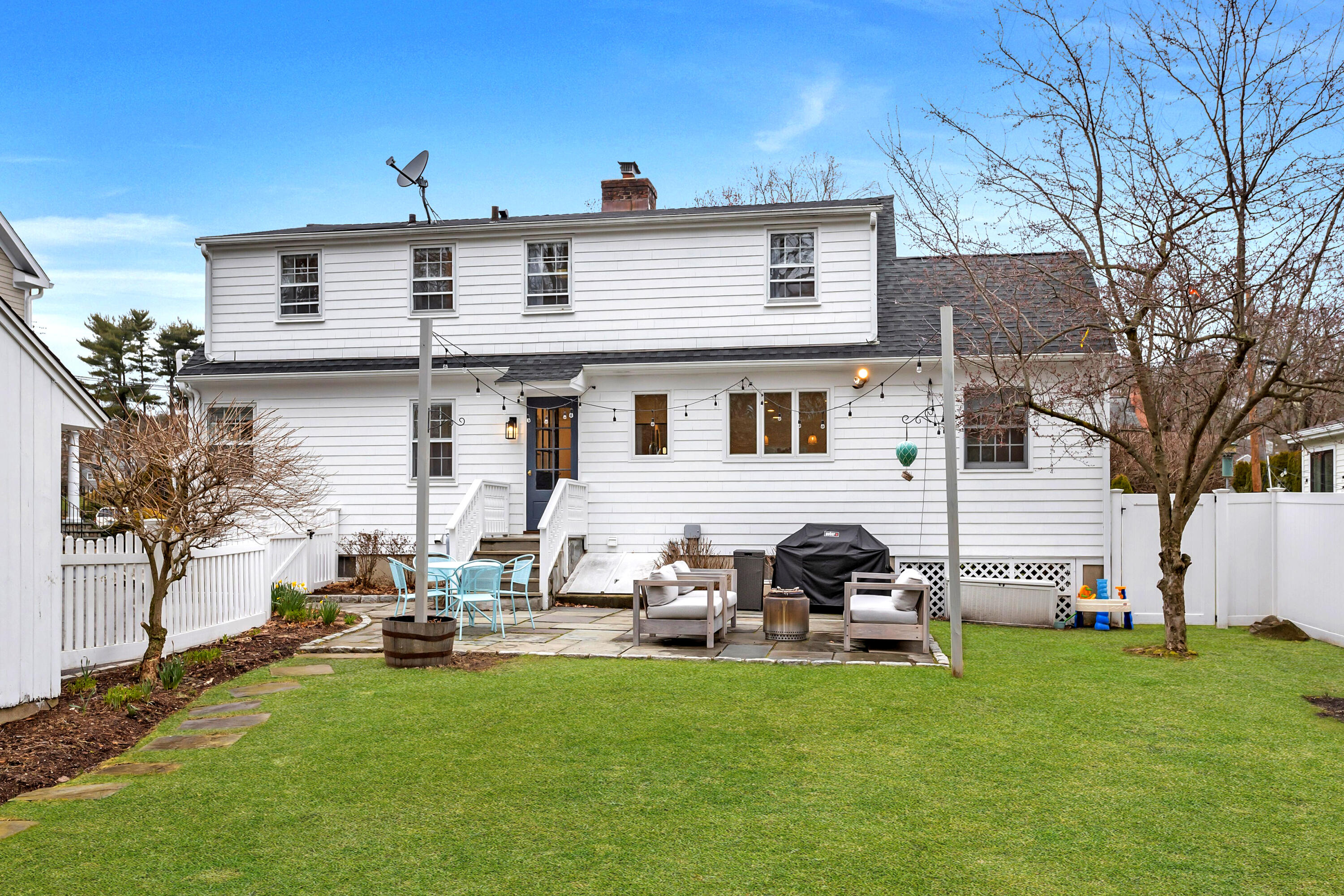 22 Intervale Road Darien, CT 06820 - Photo 30 of 37 a house view with a sitting space and garden