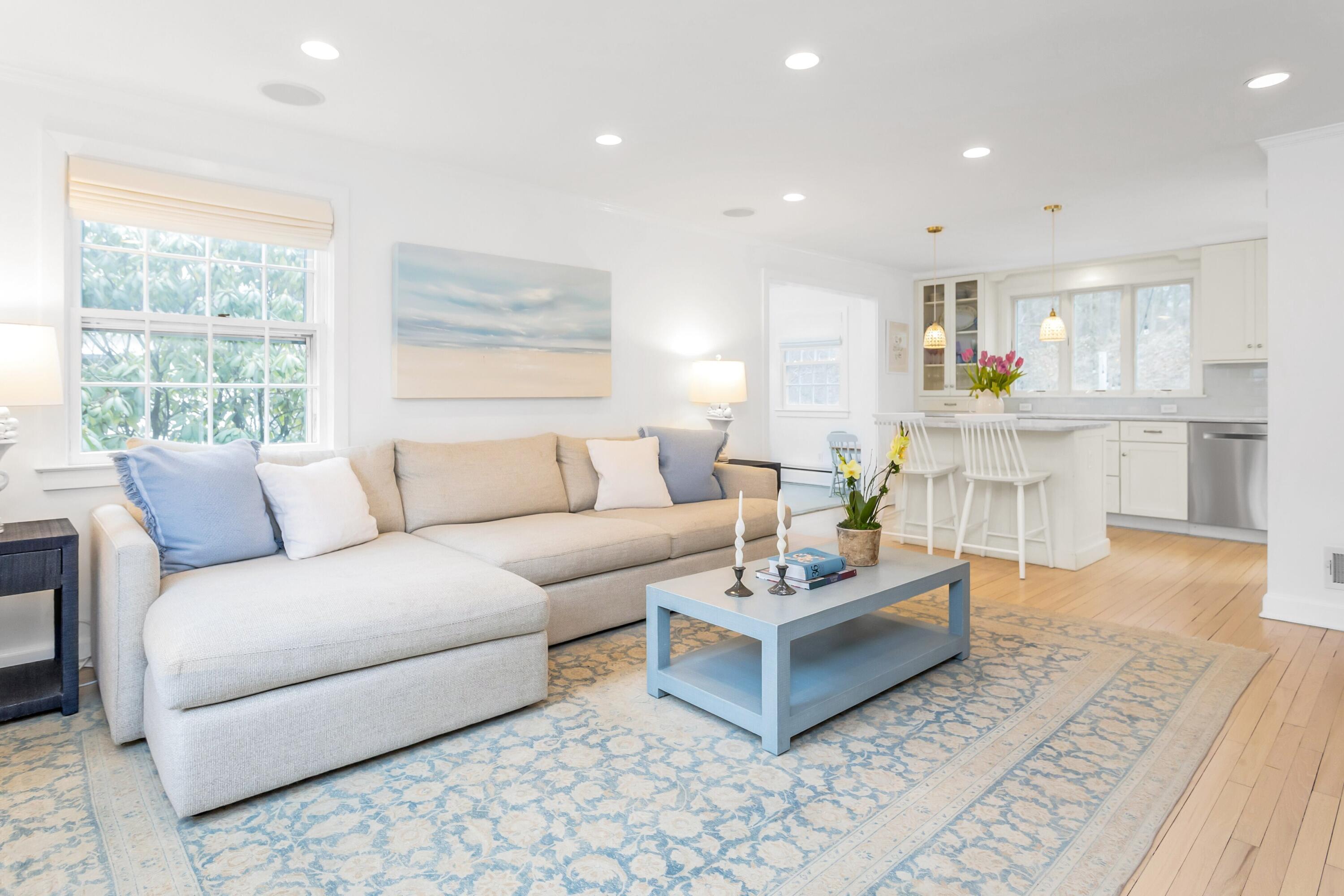 22 Intervale Road Darien, CT 06820 - Photo 3 of 37 a living room with furniture a rug and a large window