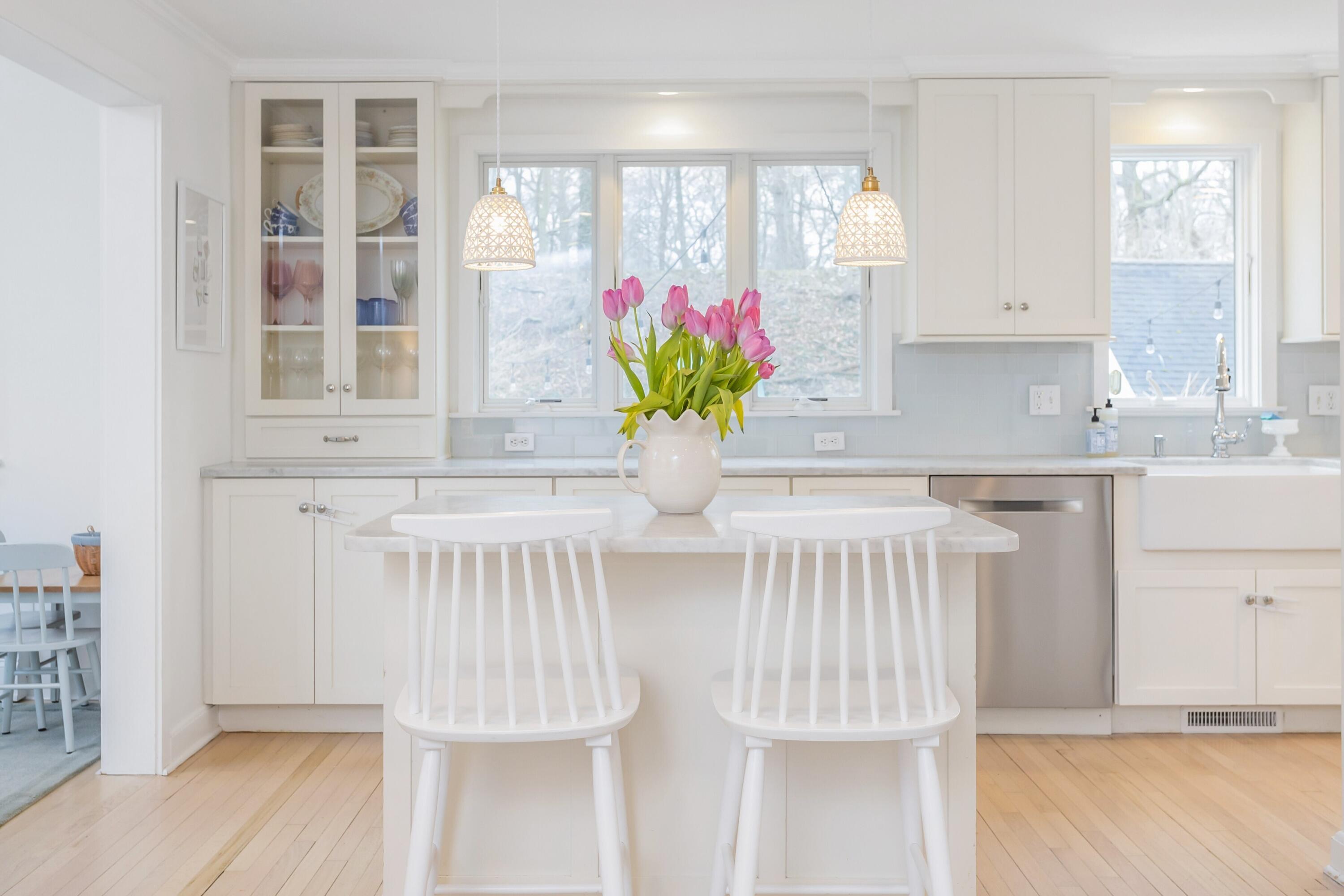 22 Intervale Road Darien, CT 06820 - Photo 9 of 37 a close view of dining table chairs wooden floor and a potted plant
