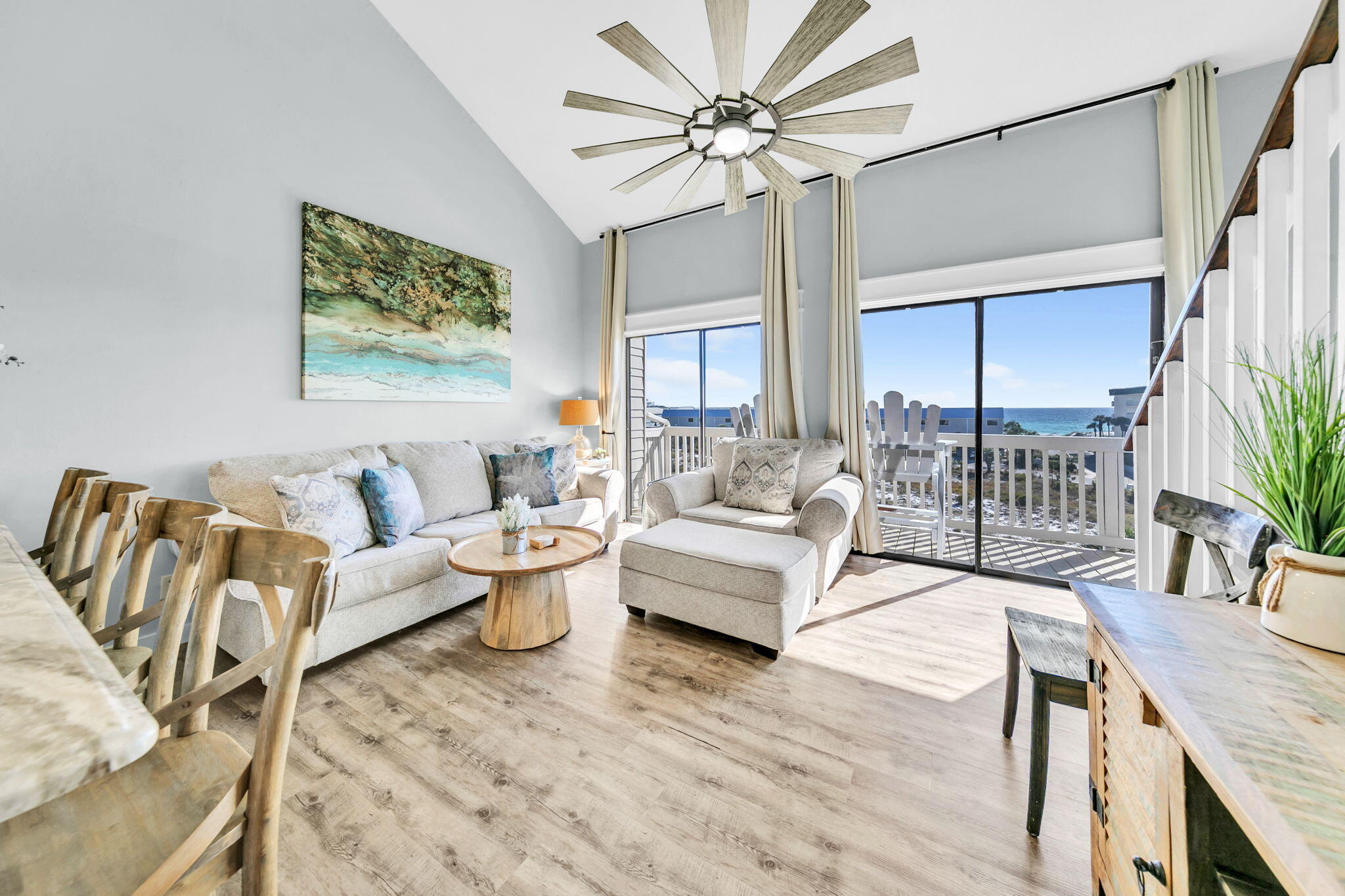 145 Beachfront Trail, Unit 307A Santa Rosa Beach, FL 32459 - Photo 17 of 60 a living room with furniture and a table