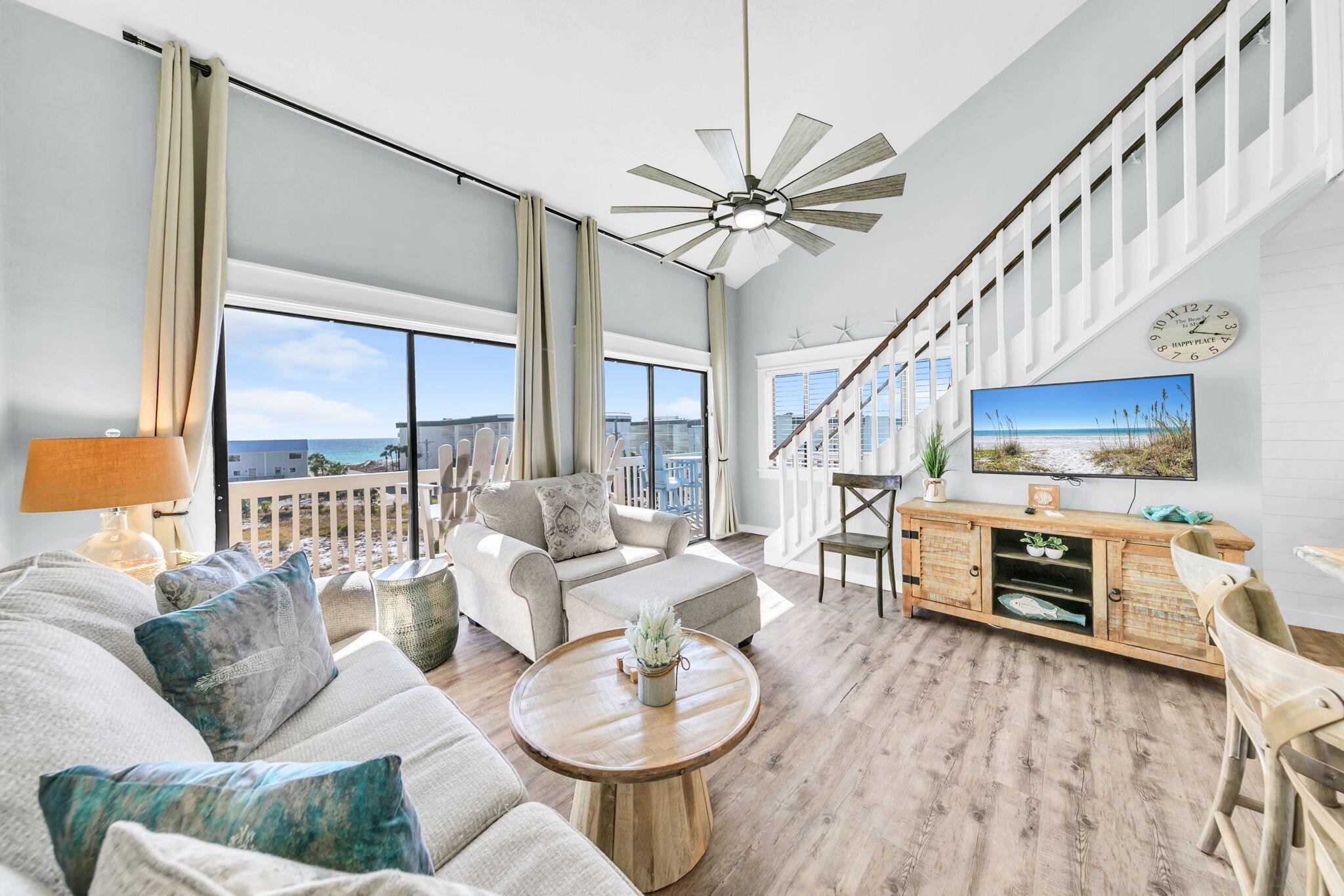 145 Beachfront Trail, Unit 307A Santa Rosa Beach, FL 32459 - Photo 19 of 60 a living room with furniture and a table