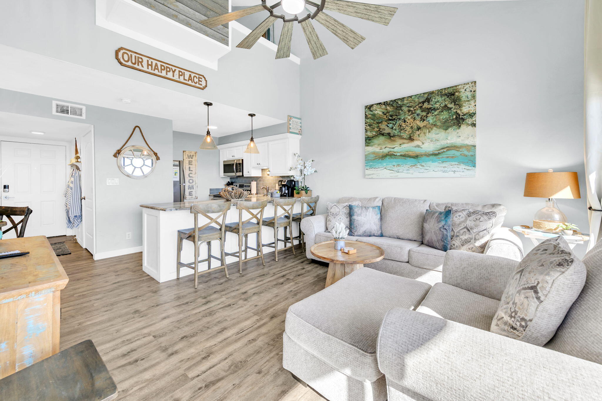 145 Beachfront Trail, Unit 307A Santa Rosa Beach, FL 32459 - Photo 21 of 60 a living room with furniture and a wooden floor