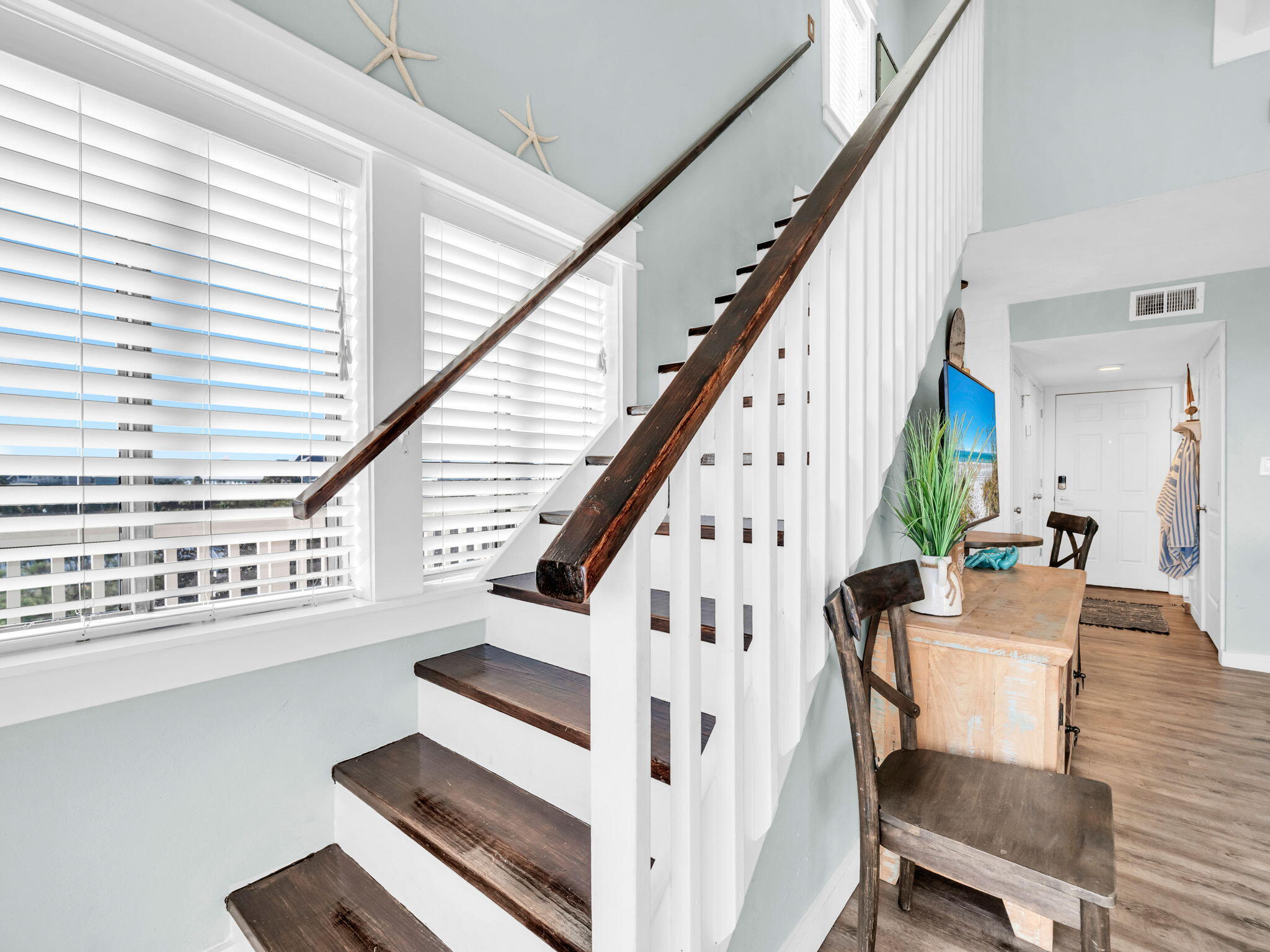 145 Beachfront Trail, Unit 307A Santa Rosa Beach, FL 32459 - Photo 23 of 60 a view of entryway and hall with wooden floor