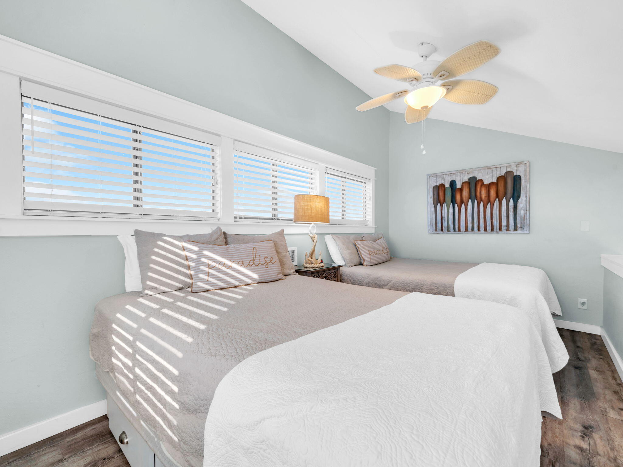 145 Beachfront Trail, Unit 307A Santa Rosa Beach, FL 32459 - Photo 24 of 60 a bedroom with two beds and a chandelier
