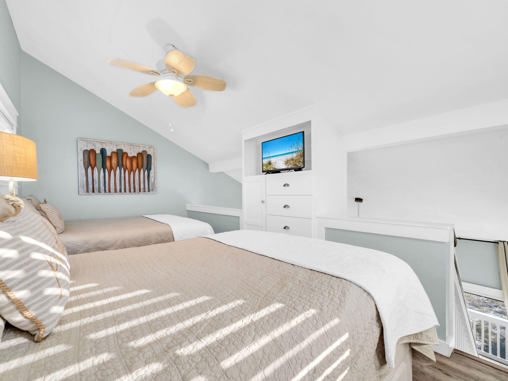 145 Beachfront Trail, Unit 307A Santa Rosa Beach, FL 32459 - Photo 25 of 60 a bedroom with a bed and a chandelier