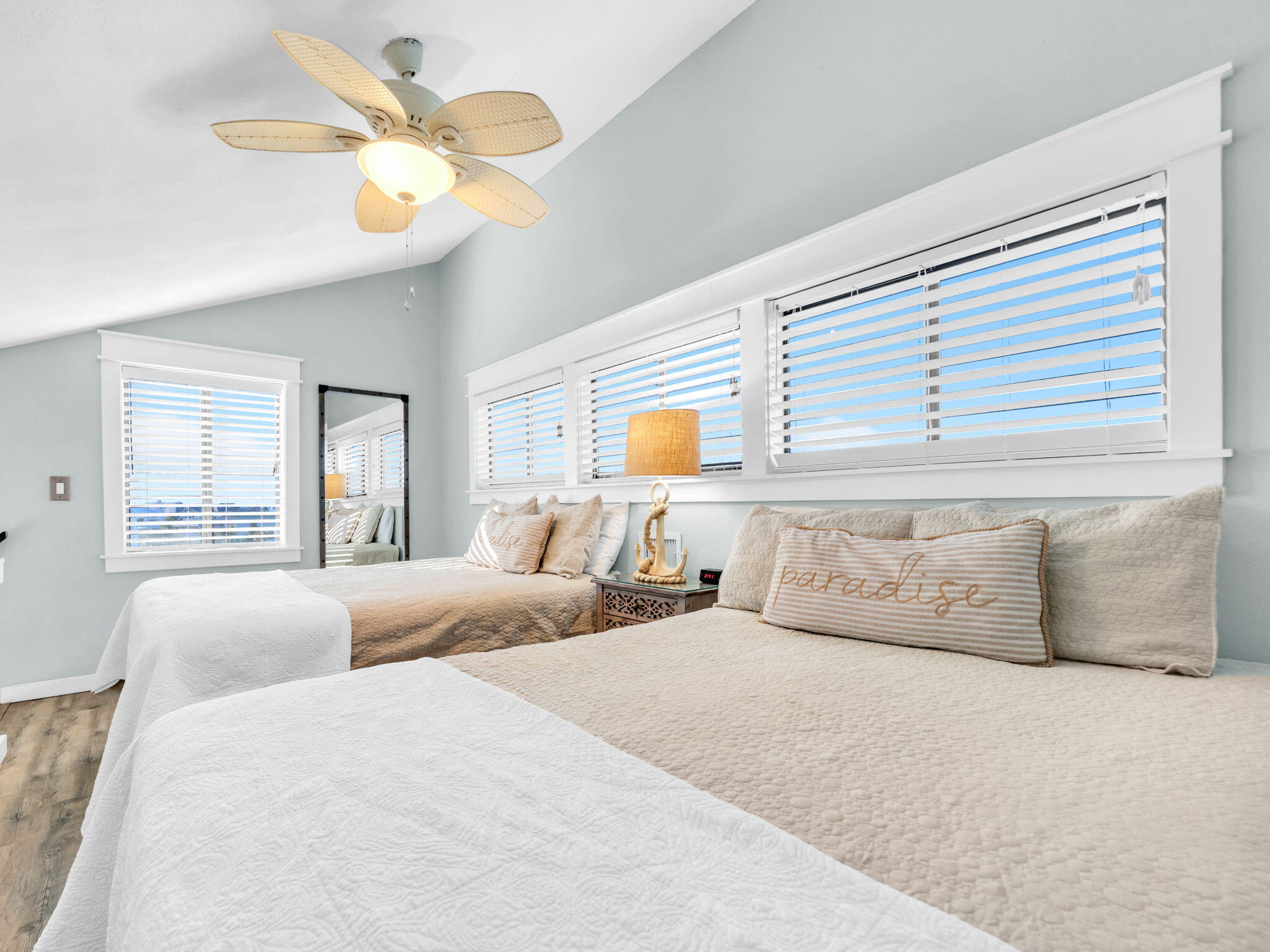 145 Beachfront Trail, Unit 307A Santa Rosa Beach, FL 32459 - Photo 27 of 60 a bedroom with a large bed and a chandelier