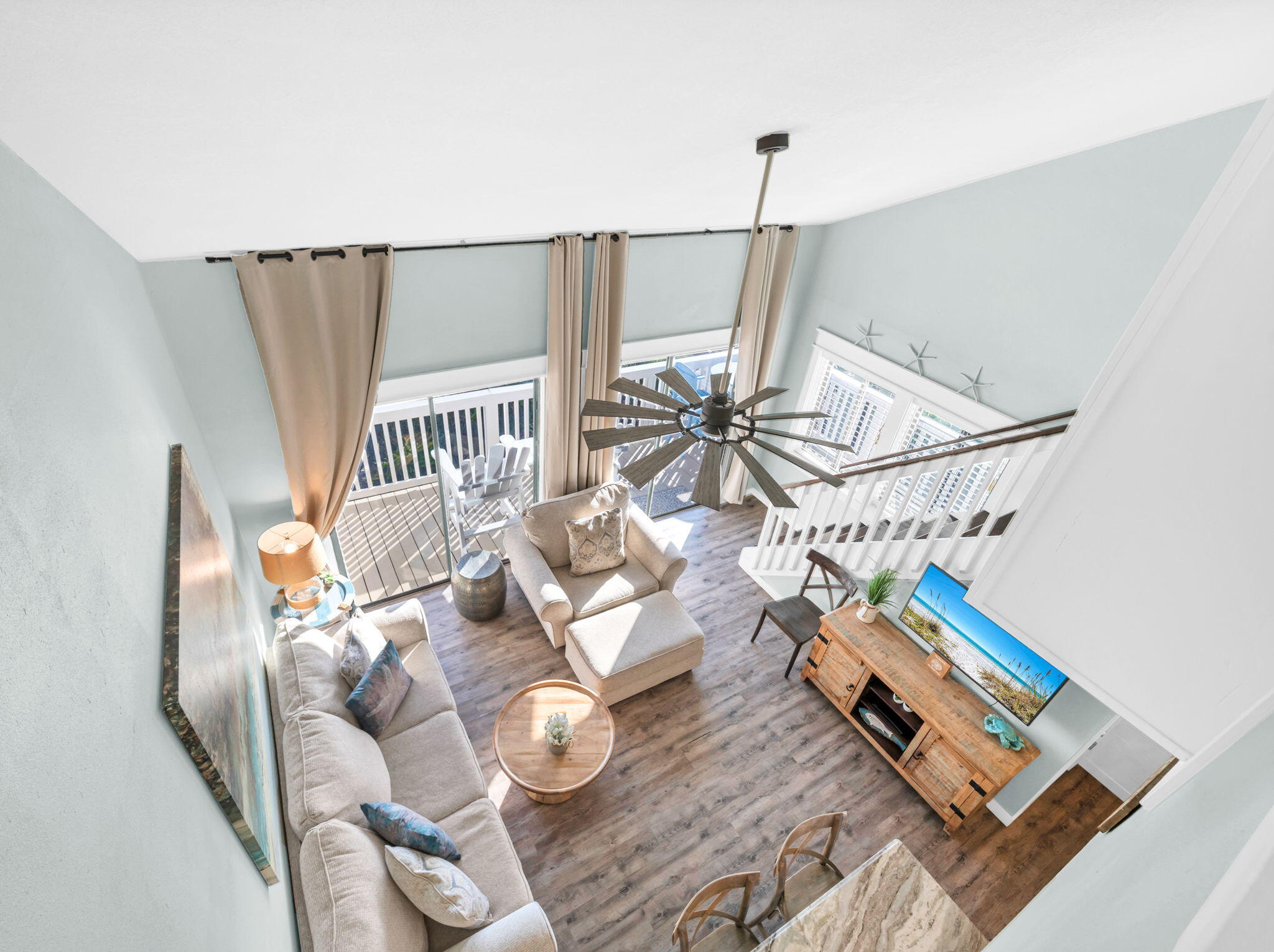 145 Beachfront Trail, Unit 307A Santa Rosa Beach, FL 32459 - Photo 29 of 60 a living room with furniture and wooden floor